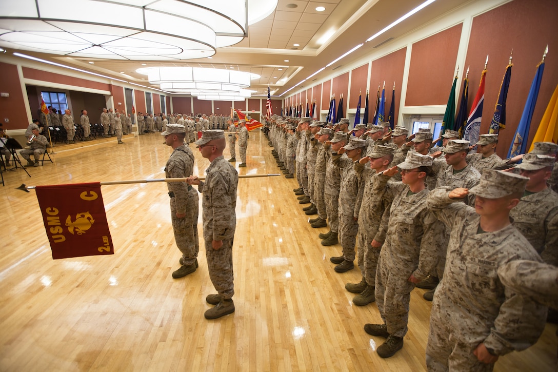 Marines in 2nd Law Enforcement Battalion stand in formation during the battalion's activation ceremony at Marine Corps Base Camp Lejeune, N.C., June 26. The battalion will be a force multiplier to the operating forces by assisting in a variety of missions that include law enforcement, route regulation, humanitarian assistance, nonlethal weapons training and military working dog employment.