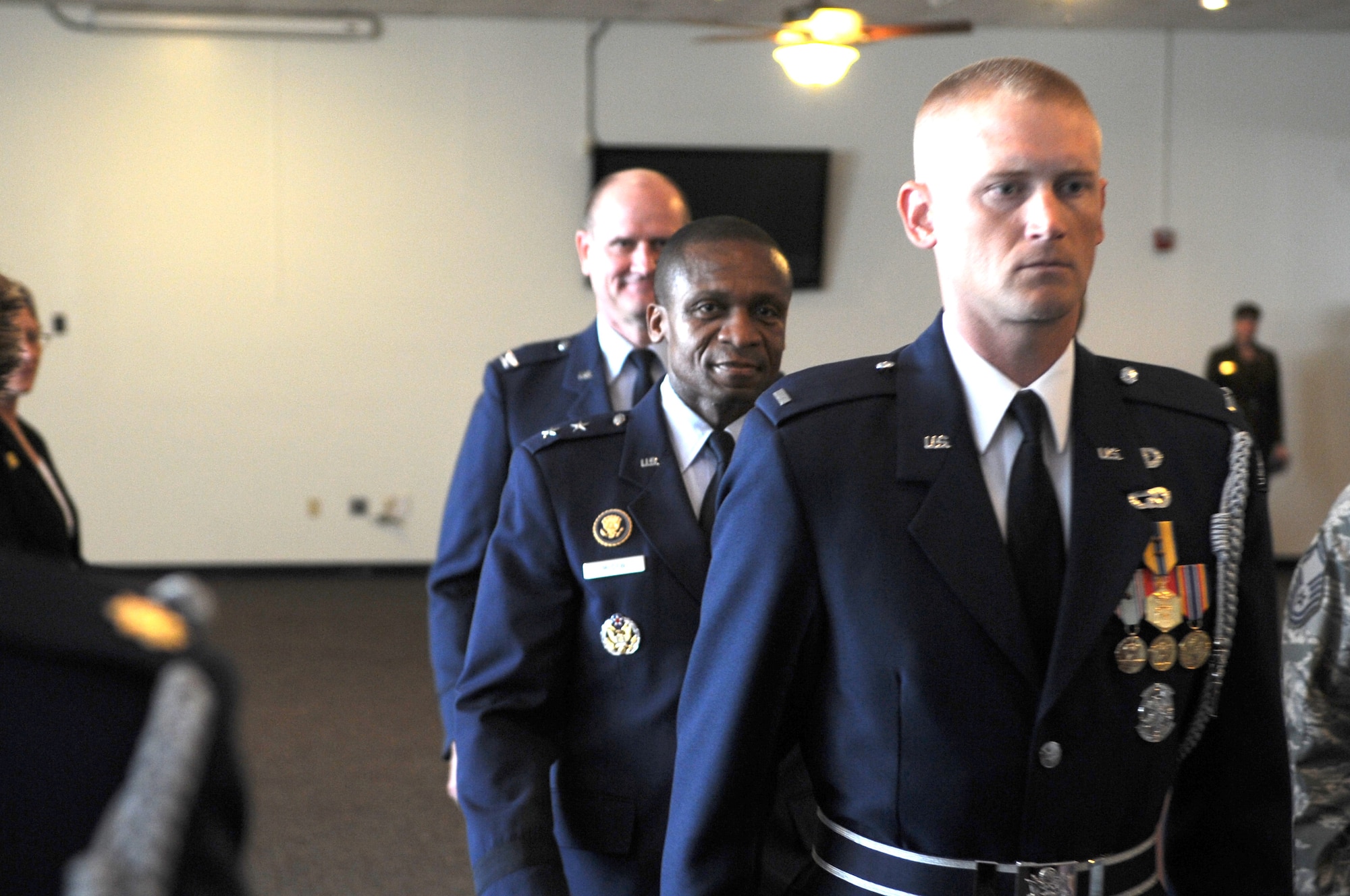 Air Force District of Washington Commander Maj. Gen. Darren W. McDew and Vice Commander Col. Jeffrey L. Stephenson are lead by U.S. Air Force Honor Guard ceremonial guardsmen to begin Stephenson’s retirement ceremony June 28, 2012 on Joint Base Andrews, Md. Stephenson spent his final year in uniform leading the Airmen of AFDW. 