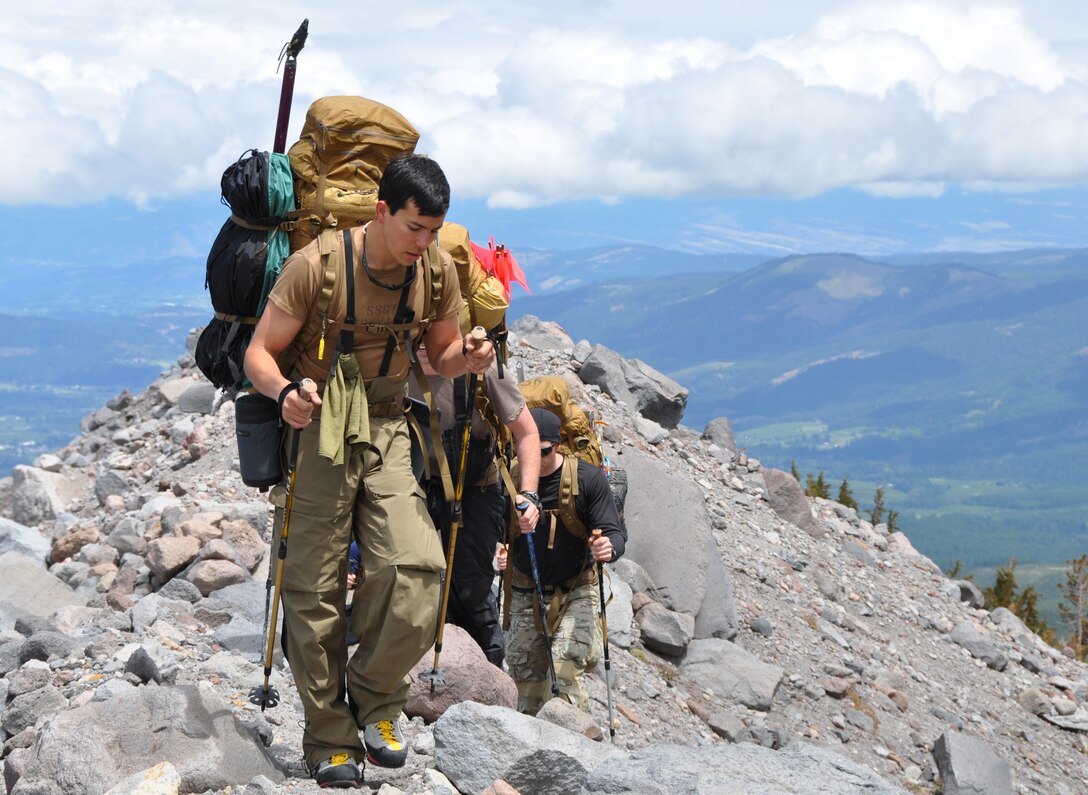 Staff Sgt. Matthew Trevino, a pararescueman with the 304th Rescue Squadron, hikes along a ridge on Mount Hood, Ore., June 26, 2012 with fellow unit members. The hike was part of a weeklong mountain search-and-rescue training with instruction from 304th RQS senior noncommissioned officers.  (U.S. Air Force photo/Staff Sgt. Anna-Marie Wyant)