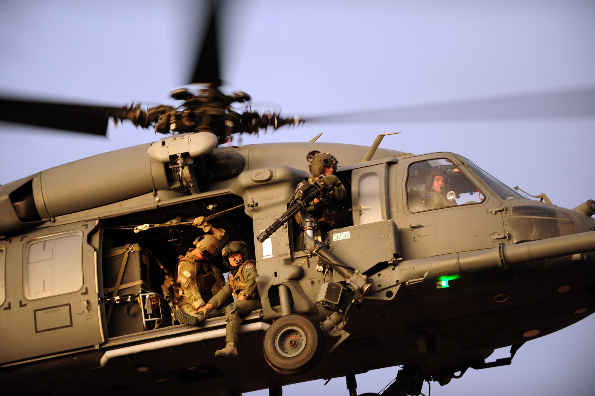 U.S. Air Force Airmen of the 563rd Rescue Group participate in day tactical training flight in Tucson, Ariz., June 27, 2012. The training was for both aerial gunners and pararescuemen. (U.S. Air Force photo by Airman 1st Class Camilla A Griffin/Released)
