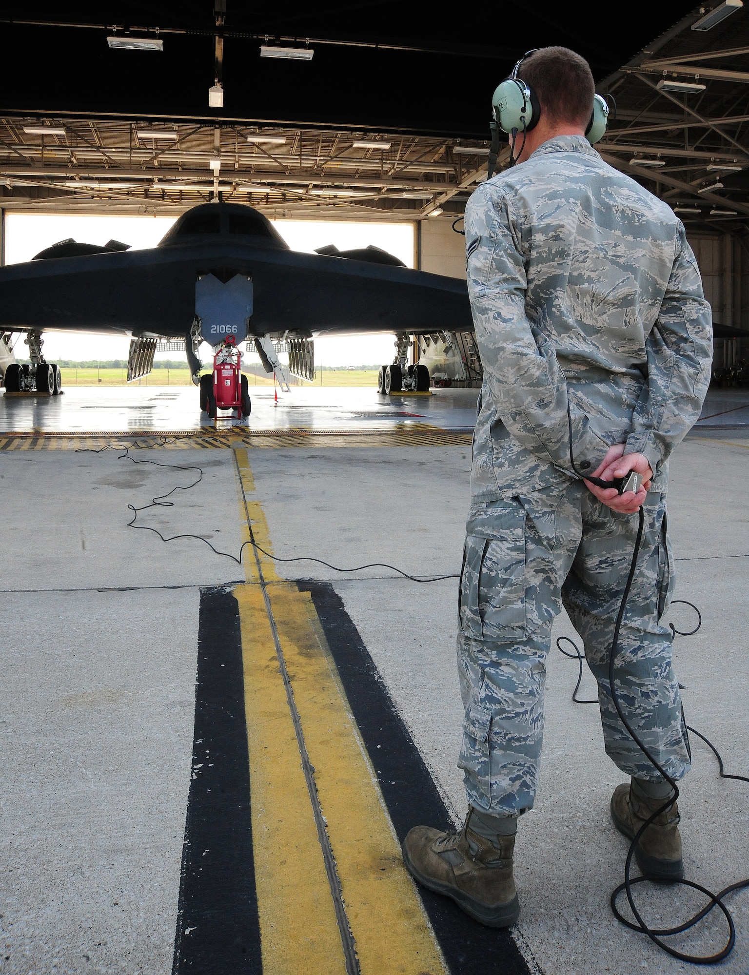 WHITEMAN AIR FORCE BASE, Mo. -- Airman 1st Class Jimmy Womack, 13th Aircraft Maintenance Unit B-2 Spirit crew chief, performs preflight checks on a B-2 Spirit from the 509th Bomb Wing prior to its departure to Smoky Hill Air National Guard Range in Salina, Kan., to participate in Global Strike Challenge 2012 June 26. All units supporting the Air Force Global Strike Command mission have been invited to compete through November showcasing their expertise, skills and capabilities. (U.S. Air Force photo/Senior Airman Nick Wilson) (Released)  
