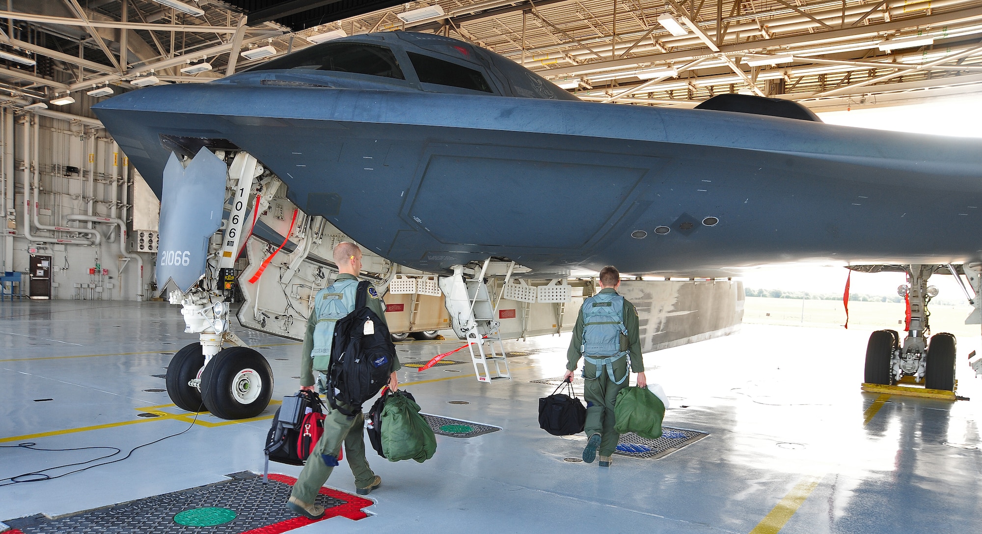 WHITEMAN AIR FORCE BASE, Mo. -- Maj. Joseph Knothe and Capt. Robert Schoeneberg, B-2 Spirit pilots from the 509th Operations Support Squadron, walk to their assigned aircraft to participate in the bomber operations portion of Global Strike Challenge 2012 June 26. Global Strike Challenge is the world's premier bomber, Intercontinental Ballistic Missile and security forces competition with units from Air Force Global Strike Command, Air Combat Command, Air Force Reserve Command and the Air National Guard. (U.S. Air Force photo/Senior Airman Nick Wilson) (Released)  
