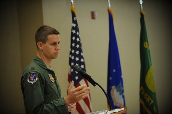 U.S. Air Force Maj. Pat Dugan, HH-60G Pave Hawk pilot and 23d Wing executive officer, gives a speech after receiving the 2011 Daedalian Exceptional Pilot Award at Moody Air Force Base, Ga., June 28, 2012.  Dugan, through hostile fire and blinding dust, led 14 Airmen in execution of 185 combat sorties resulting in 165 combat hours, 106 lives saved, and an additional 104 receiving critical life saving care. (U.S. Air Force photo by Airman 1st Class Douglas Ellis/Released)
