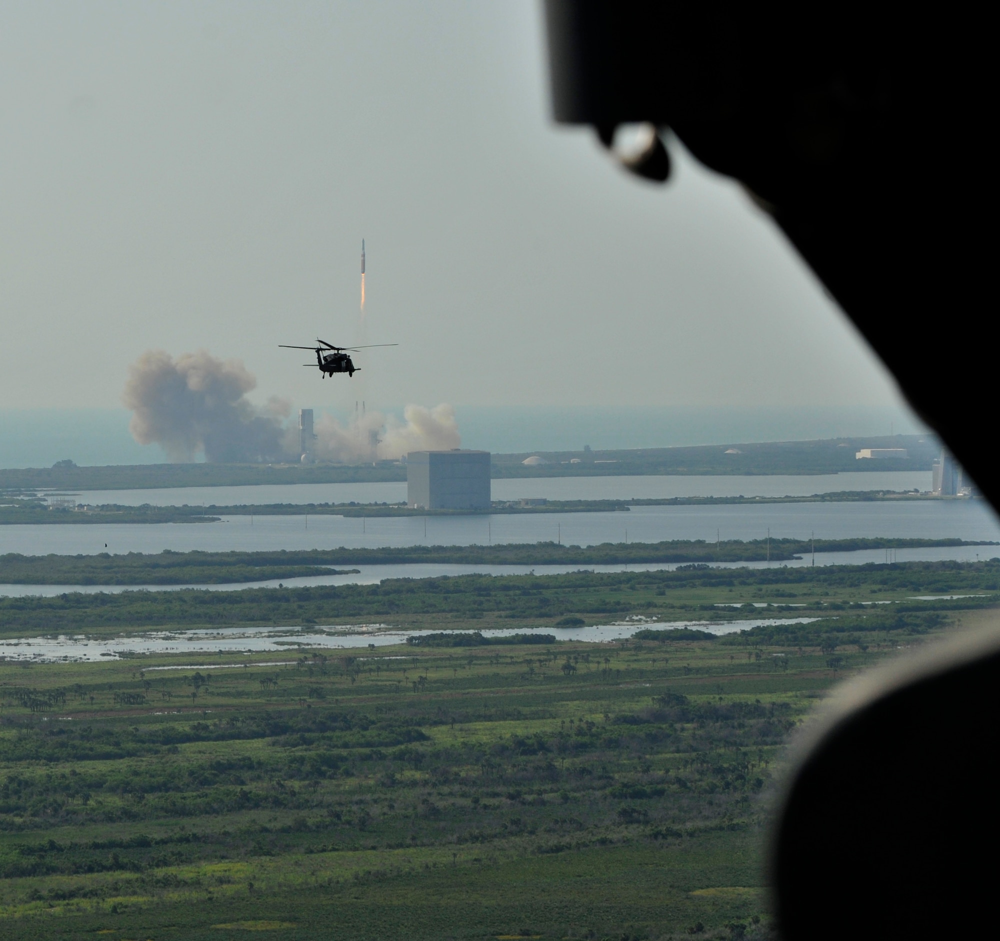 Rescue Airmen from the 920th Rescue Wing, Patrick Air Force Base, Fla., piloted two HH-60G Pave Hawk helicopters, scanning and clearing the beachline and waters that fell within the Eastern Range. The Airmen commenced their mission hours prior to the launch of the Delta-IV Heavy rocket, NROL-15, from Cape Canaveral Air Force Station Fla. which carried a classified load. (U.S. Air Force photo/Tech. Sgt. Peter Dean)
