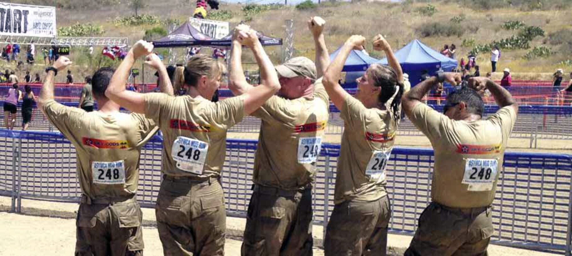 Team “Sky Gods,” from March Air Reserve Base, Calif, competed in the 2012 Hard Corps, Armed Services YMCA Mud Run at Camp Pendleton, Saturday, June 16. Members are pictured showing off their self-designed team shirts for the competition.
(Courtesy photo to U.S. Air Force)