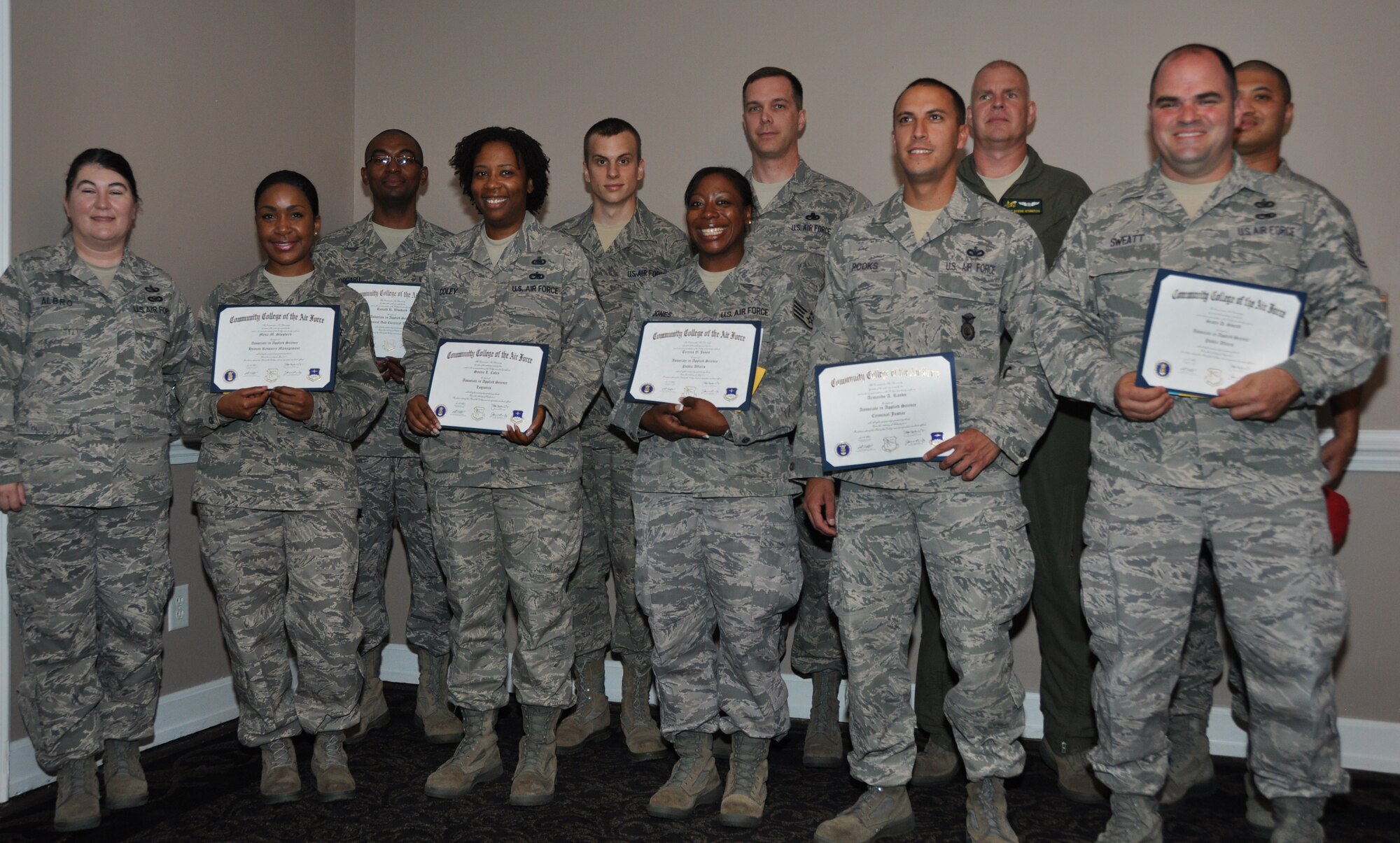 Congratulations to the CCAF class of June 2012! Reservists with the 916th Air Refueling Wing received their associate degrees during the June drill weekend. (USAF photo by MSgt. Wendy Lopedote, 916ARW/PA, released)
