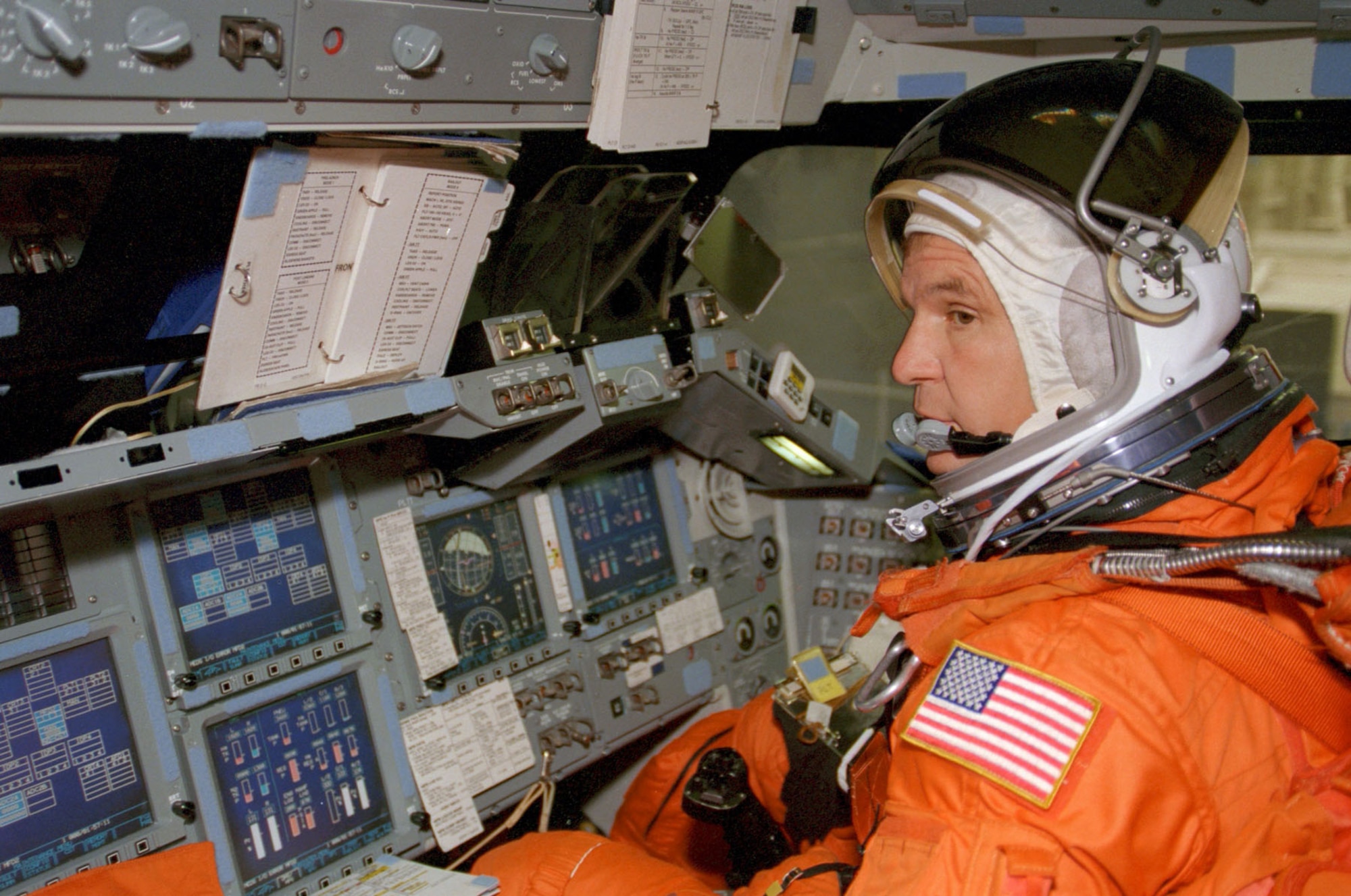 Astronaut Michael J. Bloomfield, STS-97 pilot, mans the pilot's station of a Crew Compartment Trainer in July 1999 during a training exercise at Johnson Space Center's Systems Integration Facility. (NASA photo)