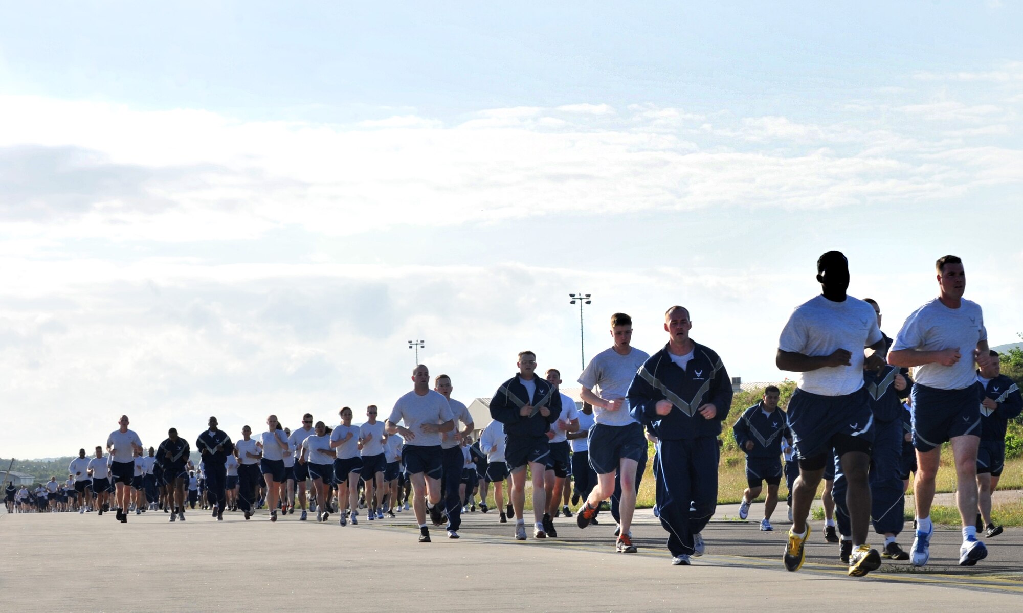 Members of Team Ramstein competed in multiple events for the warrior day challenge here, June 22, 2012. The 86th Security Forces Squadron took first place, with the 86th Vehicle Readiness Squadron and 86th Civil Engineer Squadron taking second and third places, respectively.  Teams participated in 13 events that tested their physical prowess, including a 1.5-mile relay, ultimate football, dodgeball, a bench-press competition and concluded with the warrior challenge. (U.S. Air Force photo/Senior Airman Caitlin O'Neil-McKeown)