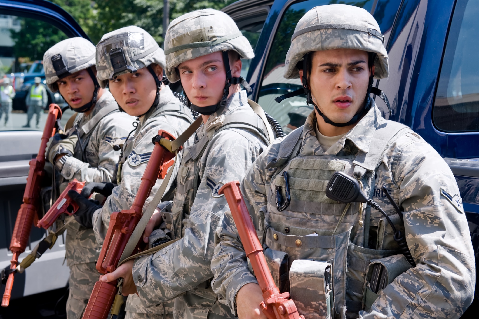 YOKOTA AIR BASE, Japan -- From the right, Airman Enmanuel Crespo, Airman 1st Class Patrick Kelly, Senior Airman Tommy Ngo and Airman 1st Class Oscar Canteros, 374th Security Forces Squadron patrolmen, prepare to confront a simulated hostile gunman during the First Responders Rodeo at Yokota Air Base, Japan, on June 26, 2012. The exercise enabled joint responders to coordinate proper response procedures in a simulated environment. (U.S. Air Force photo by Osakabe Yasuo)