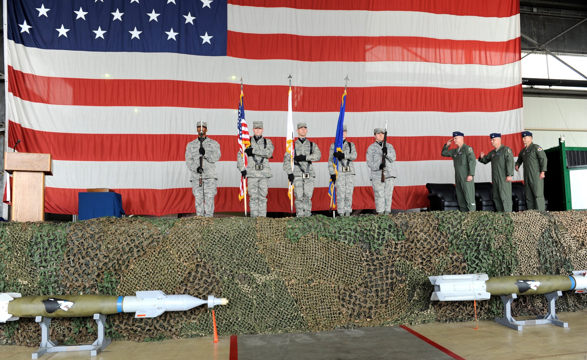 The Kunsan Honor Guard presents the colors during the 8th Operations Group change of command ceremony June 29, 2012, at Kunsan Air Base, Republic of Korea. Col. James Sturgeon assumed command of the group from Col. Craig Leavitt. (U.S. Air Force photo/Senior Airman Brigitte N. Brantley)