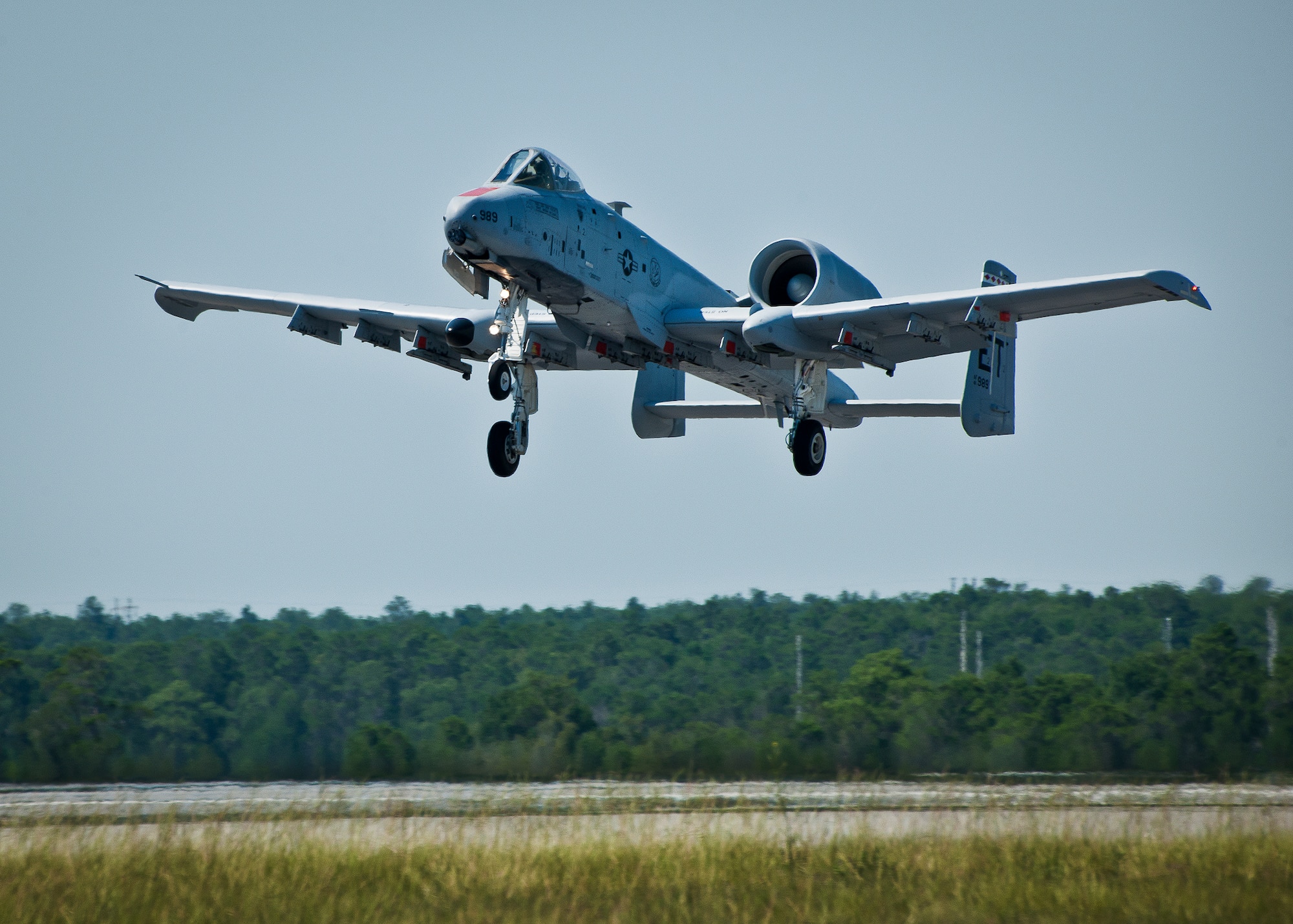 An A-10C Thunderbolt II takes off from Eglin Air Force Base, Fla., June 28, 2012, marking the first flight of an aircraft powered solely by a alcohol-derived jet fuel blend.  ATJ, or Alcohol to Jet, is a cellulousic-based fuel. It can be derived using wood, paper, grass, anything that is a cell-based material. The sugars extracted from these materials are fermented into alcohols, which are then hydro-processed into the aviation-grade kerosenes used for aviation fuel. (U.S. Air Force photo/Samuel King Jr.)