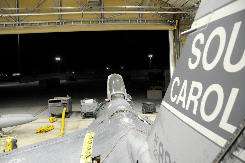 An F-16 from the South Carolina Air National Guard sits in the phase dock at Kandahar Airfield, Afghanistan, while it undergoes a phase inspection. Personnel are deployed from McEntire Joint National Guard Base, S.C., in support of Operation Enduring Freedom. Swamp Fox F-16s, pilots, and support personnel began their Air Expeditionary Force deployment early April to take over flying missions for the air tasking order and provide close air support for troops on the ground in Afghanistan. (U.S. Air Force photo/Tech Sgt. Stephen Hudson)