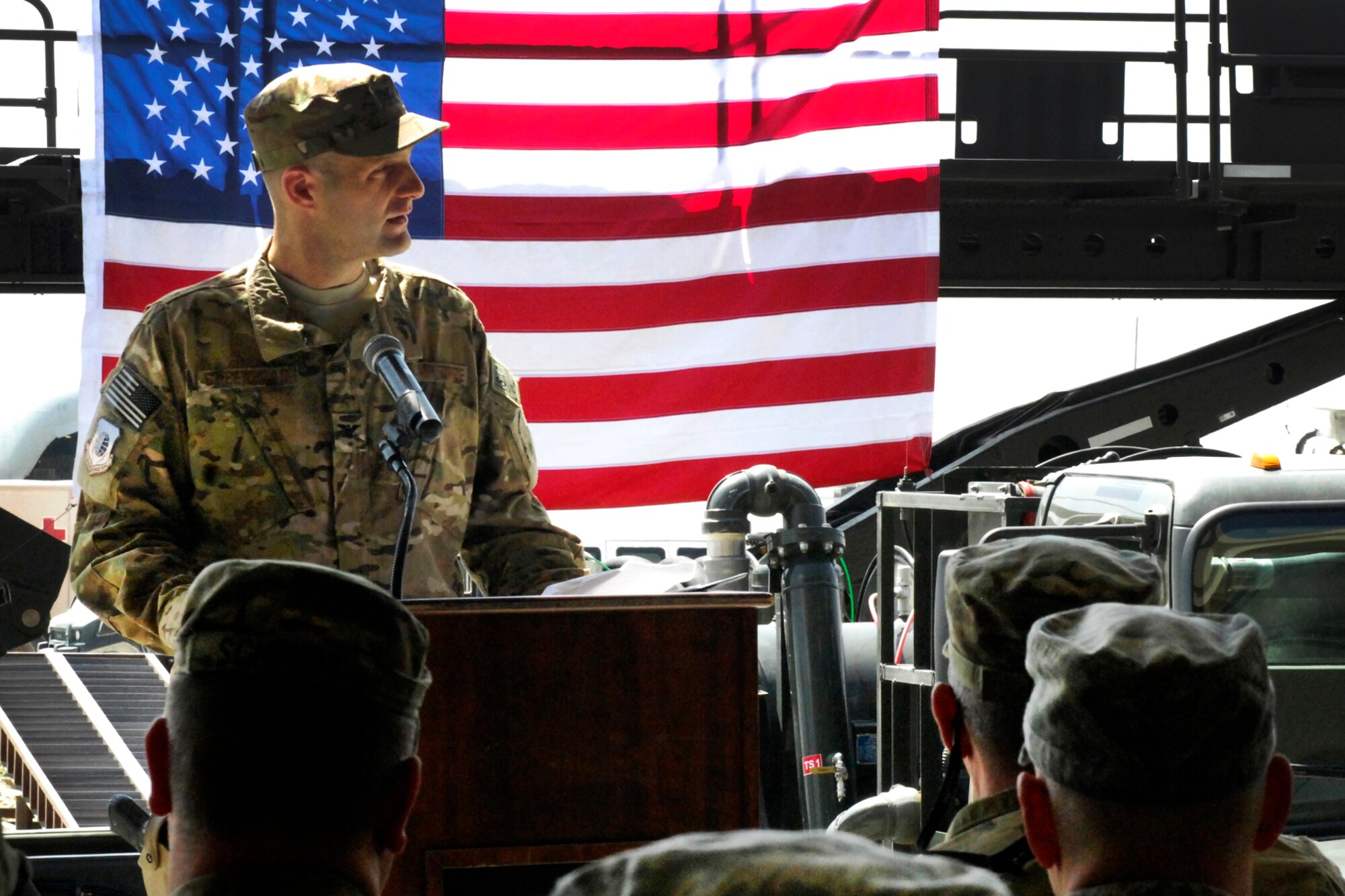 Col. Brian Greenroad, new Commander of the 455th Expeditionary Mission Support Group, addresses the crowd after assuming command of the 455 EMSG to at Bagram Airfield, Afghanistan,  June 28, 2012. (U.S. Air Force photo/Staff Sgt. Jeff Nevison)