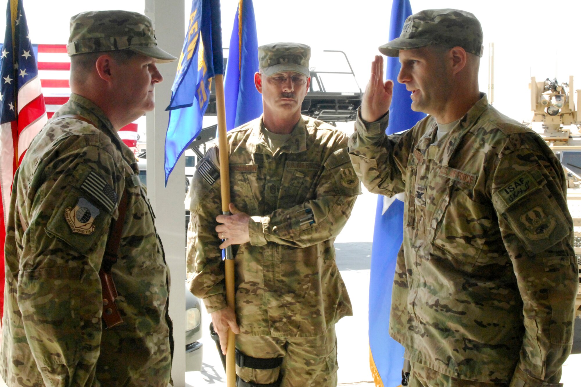 Col. Brian Greenroad (right), salutes Brig. Gen. Thomas Deale, 455th Air Expeditionary Wing commander, as he assumes command of the 455th Expeditionary Mission Support Group at Bagram Airfield, Afghanistan, June 28, 2012. (U.S. Air Force photo/Staff Sgt. Jeff Nevison)
