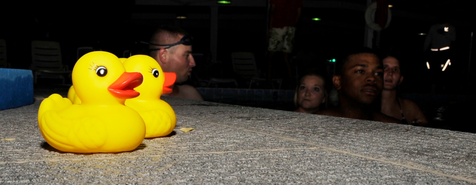SOUTHWEST ASIA – Several 386th Air Expeditionary Wing Airmen took part in the rubber ducky race during the 101 Days of Summer Pool Party hosted by the 386th Force Support Squadron here June 23. The Airmen also participated in a noodle race and ping-pong pick-up.  (U.S. Air Force photo/Staff Sgt. Alexandra M. Boutte) (U.S. Air Force photo/Staff Sgt. Alexandra M. Boutte) 