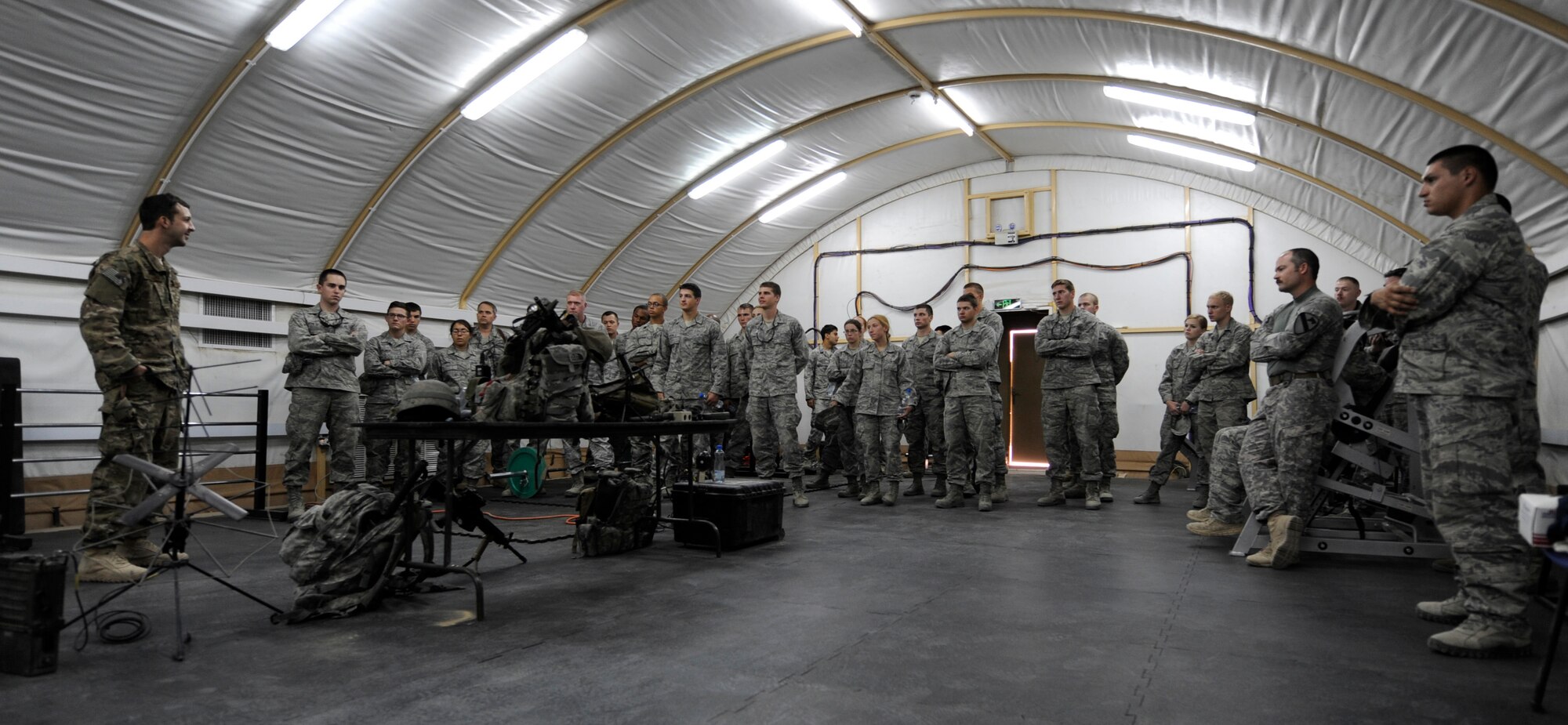 SOUTHWEST ASIA – Twenty-three Air Force Academy cadets took a trip to the 82nd Expeditionary Air Support Operations Squadron June 20. Staff Sgt. Eric Velazquez, tactical air control party member, explains the importance of his job to cadets during a demonstration.  (U.S. Air Force photo/Staff Sgt. Alexandra M. Boutte)