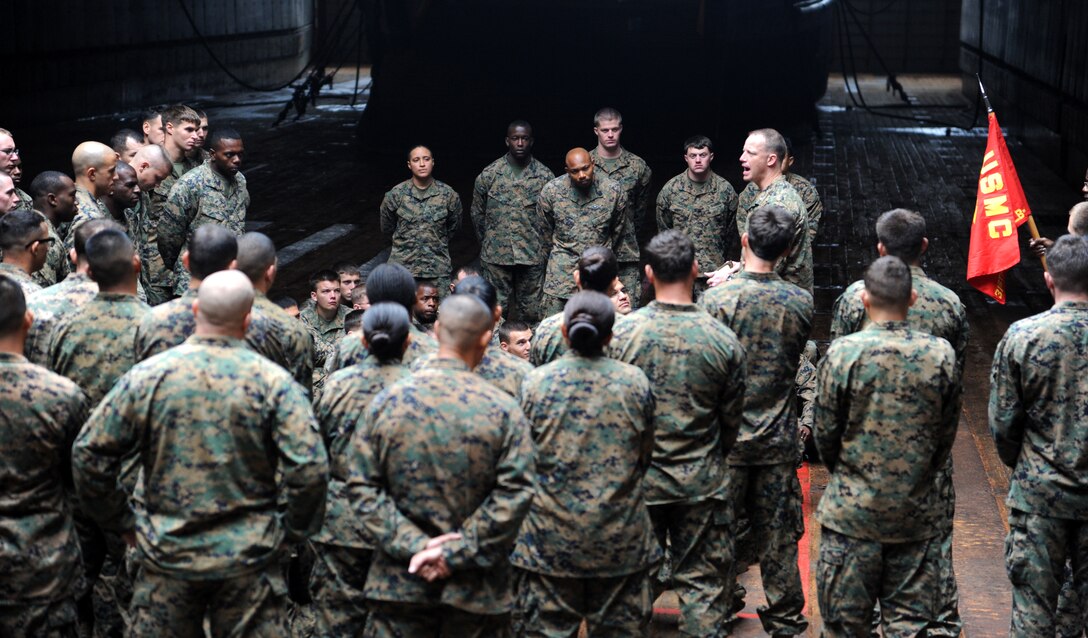 Marines and Sailors of Combat Logistics Battalion 31, 31st Marine Expeditionary Unit, listen to Lt. Col. William Arick, commanding officer of CLB-31, 31st MEU, following a promotion ceremony aboard the forward-deployed amphibious dock landing ship USS Germantown (LSD 42).  Elements of the 31st MEU embarked on Germantown to participate in Cobra Gold 2012, an annual Thai-U.S. co-sponsored joint and multinational exercise designed to advance security throughout the Asia-Pacific region and enhance interoperability with participating nations. (U.S. Navy photo by Mass Communication Specialist 1st Class Johnie Hickmon/Released)