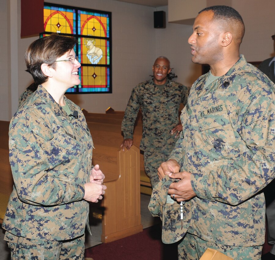 Rear Adm. Margaret Kibben, 18th chaplain of the Marine Corps and deputy chief of Navy chaplains, talks with Gunnery Sgt. Fredrick Sloan, a member of Headquarters and Support Company, Marine Corps Logistics Base Albany, at the Base Chapel, Feb. 22.