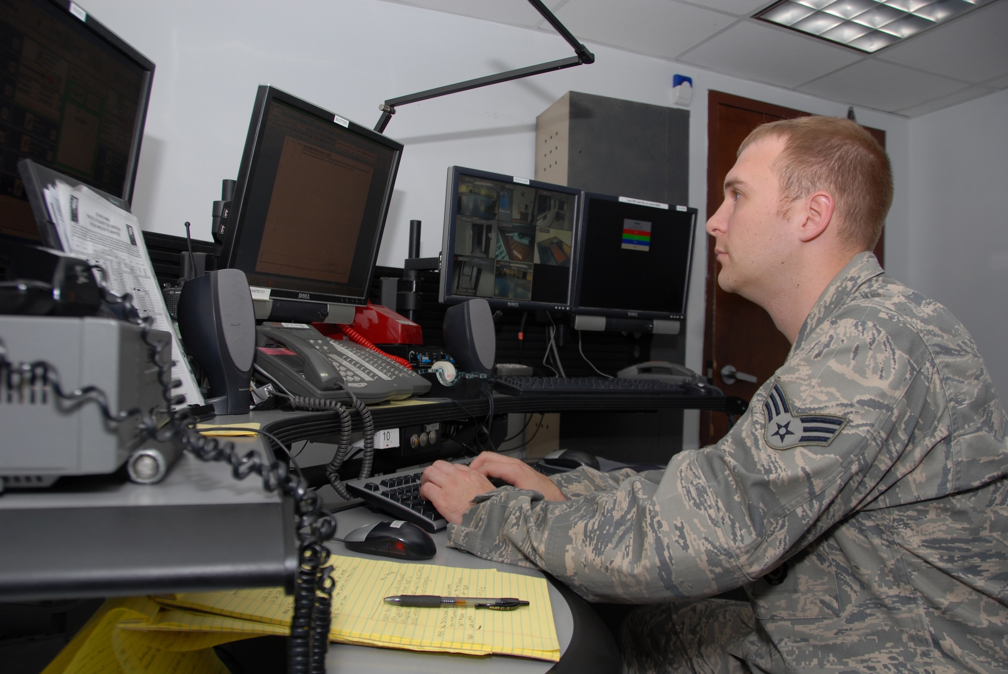 Senior Airman Justin Urey Controller, 78th Security Forces, works the midshift helping keep Robins safe after dark. (U.S. Air Force photo by Ed Aspera)