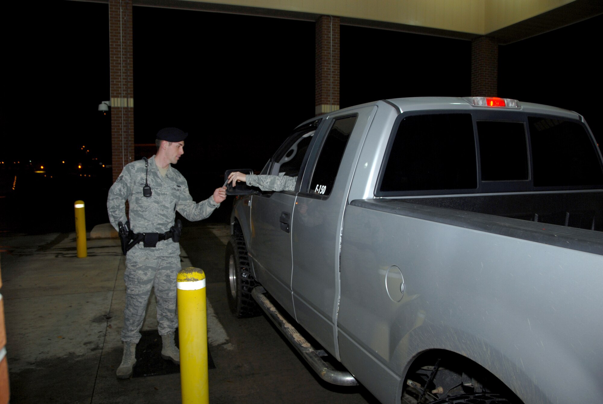 Senior Airman Christopher Gehrke, base entry controller, is one of many with the 78th Security Forces who work the midshift to help keep Robins safe after dark.