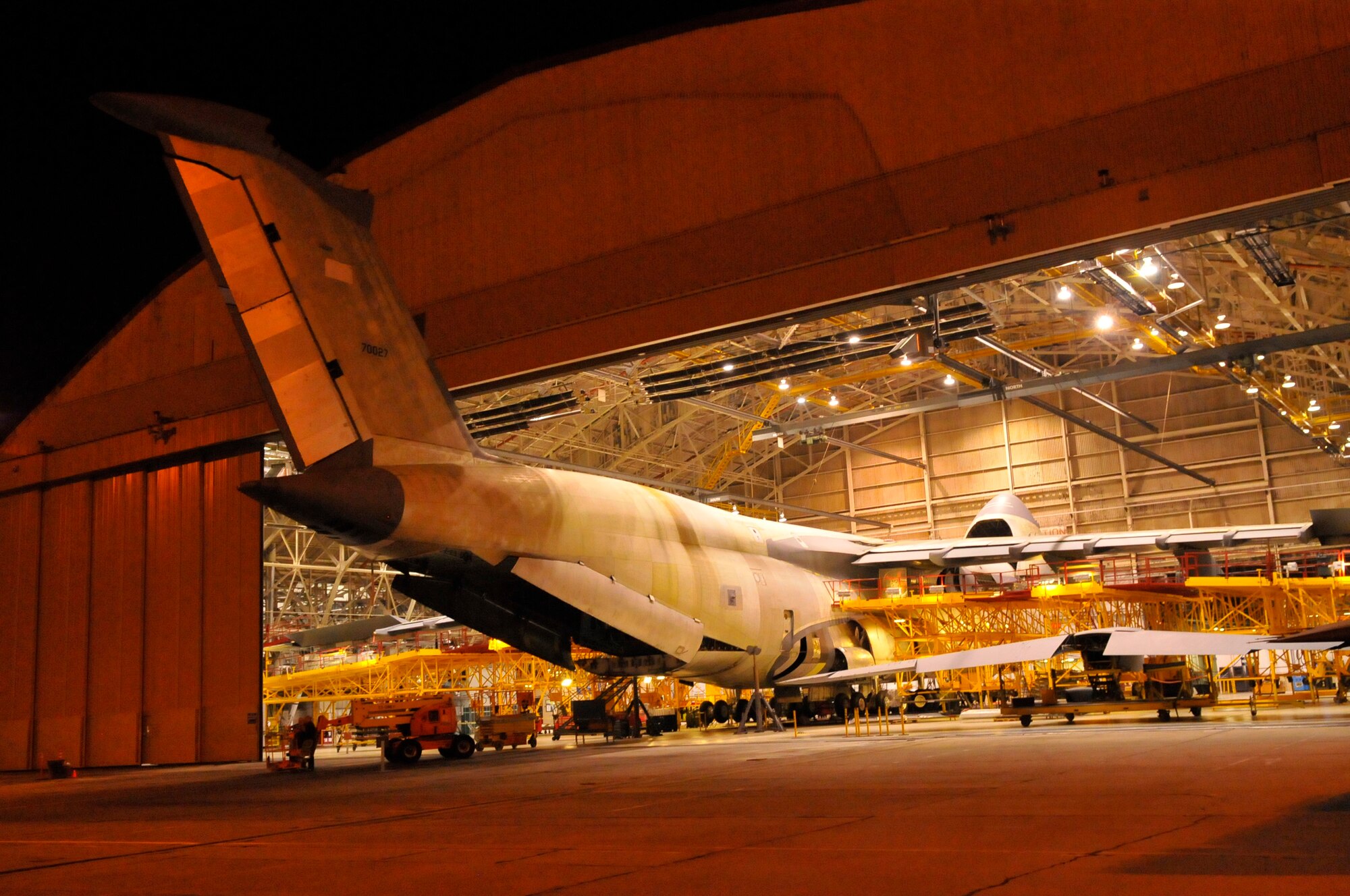 A C-5 from Travis Air Force Base, Calif., sits in a Robins hanger.  The aircraft is here for maintenance. (U.S. Air Force photo by Sue Sapp)