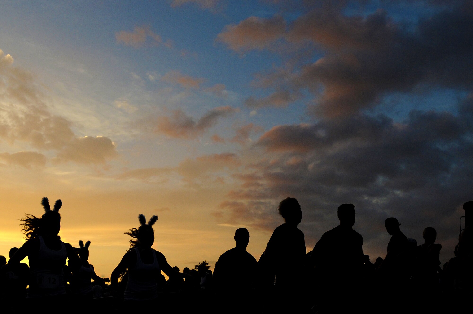 Competitors take-off at the beginning of the Swamp Romp, a five-mile run through the mud along the Nu'upia ponds and down the Fort Hase Beach at Marine Corps Base Hawaii - Kaneohe Bay Feb. 25, 2012. This unique run, known as the "Dirtiest race in Hawaii" takes teams  over and under the challenge-laden course that included unlimited mud, low crawling, jumping, climbing and falling in the mud. (U.S. Air Force photo/Staff Sgt. Mike Meares)