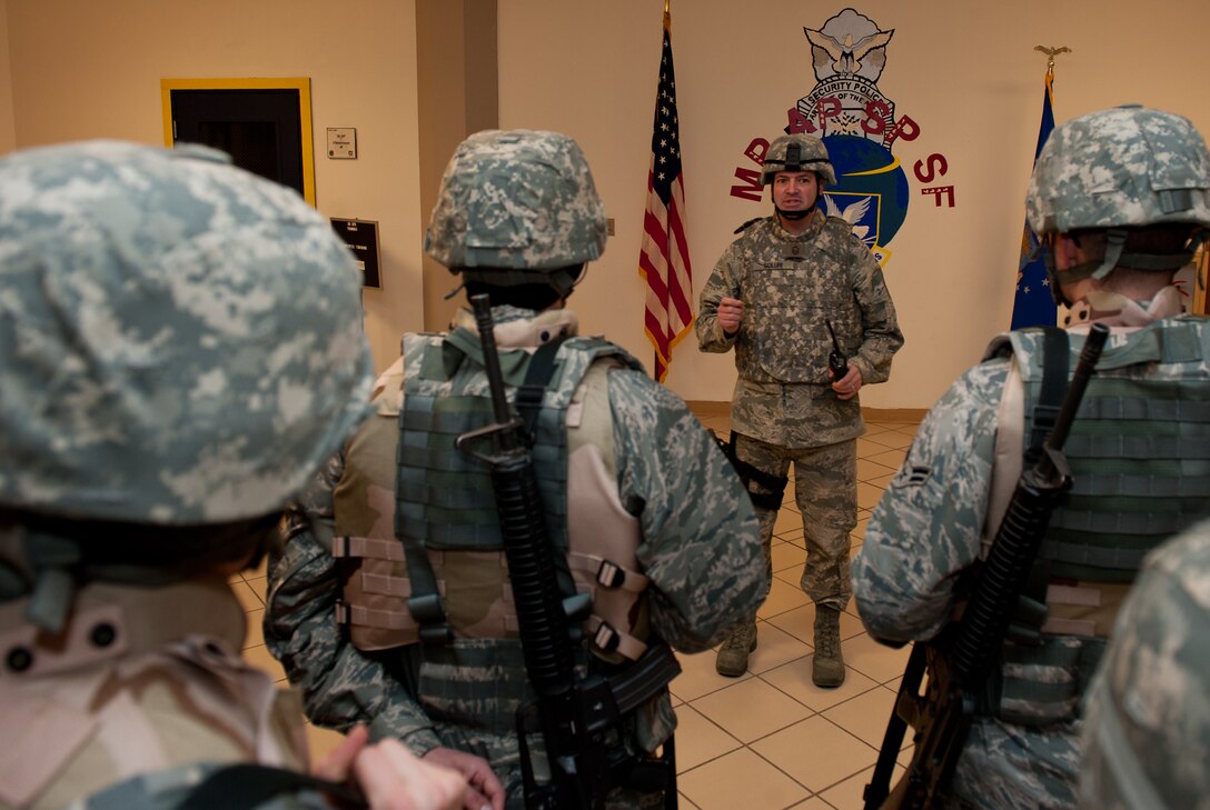 Senior Master Sgt. Eric Soluri, 28th Security Forces Squadron operations superintendent, briefs augmentees on their mission during an Operational Readiness Exercise at Ellsworth Air Force Base, S.D., Feb. 24, 2012. Augmentees are trained and briefed on their duties and responsibilities prior to being assigned to their posts. (U.S. Air Force photo by Airman 1st Class Kate Thornton/Released)