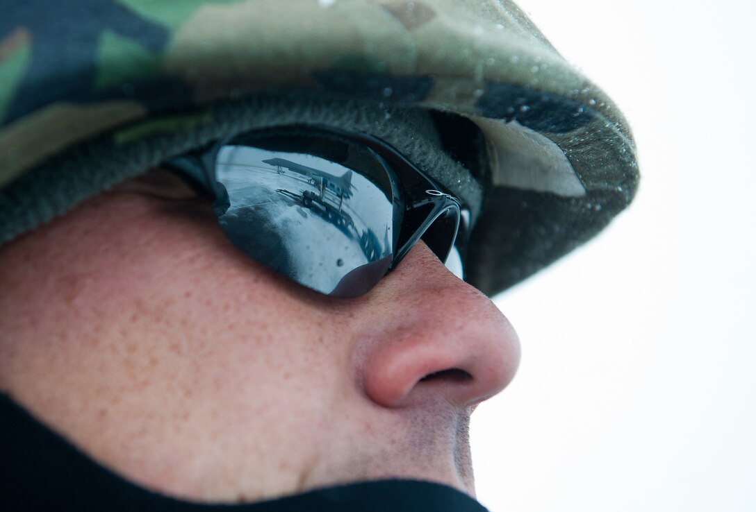 Master Sgt. Jason Schultz, 28th Aircraft Maintenance Squadron operational readiness exercise squadron cell boss, supervises Airmen loading munitions into a B-1B during an Operational Readiness Exercise at Ellsworth Air Force Base, S.D., Feb. 24, 2012. Ellsworth conducts several OREs to prepare Airmen to deploy combat ready forces during wartime contingencies. (U.S. Air Force photo by Airman 1st Class Kate Thornton/Released)