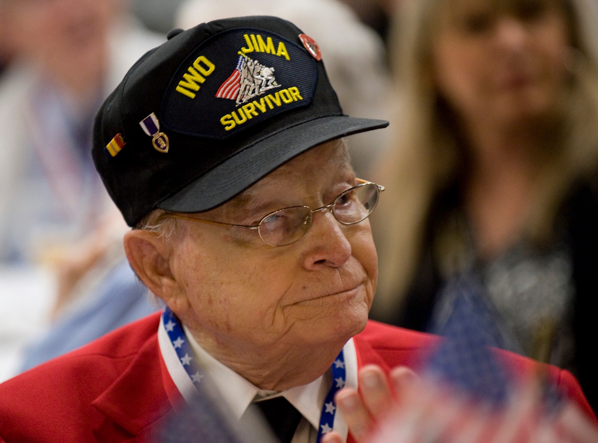 A World War II survivor watches the band perform during the WWII veterans luncheon on Barksdale Air Force Base, La., Feb. 24. Only two million of the 16.5 million veterans who served are still alive, according to retired Col. Steve dePyssler, Barksdale retiree office director. (U.S. Air Force photo/Senior Airman Chad Warren)(RELEASED)