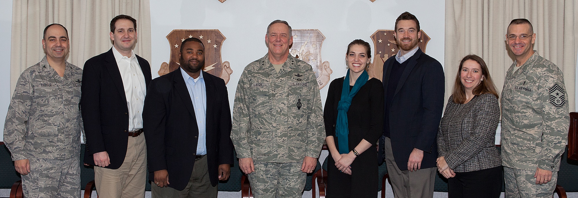 Maj. Gen. C. Donald Alston, 20th Air Force commander, Col. George Farfour, 90th Missile Wing vice commander, and Chief Master Sgt. David Nordel, 20th AF command chief, pose for a group photograph with Joseph Jones, military legislative assistant; Sen. Tom Harkin (D-IA); Wendy Gnehm,  military legislative assistant; Sen. Mike Enzi (R-WY); Sierra Forbes, military legislative assistant; Sen. Mike Crapo (R-ID); Josh Hodges, military legislative assistant; Sen. David Vitter (R-LA);  Landon Stropko, military legislative assistant, Rep. Cynthia Lummis (R-WY) as part of the staff delegation visit Feb. 23, at 20th AF Headquarters. (U.S. Air Force photo by Matt Bilden