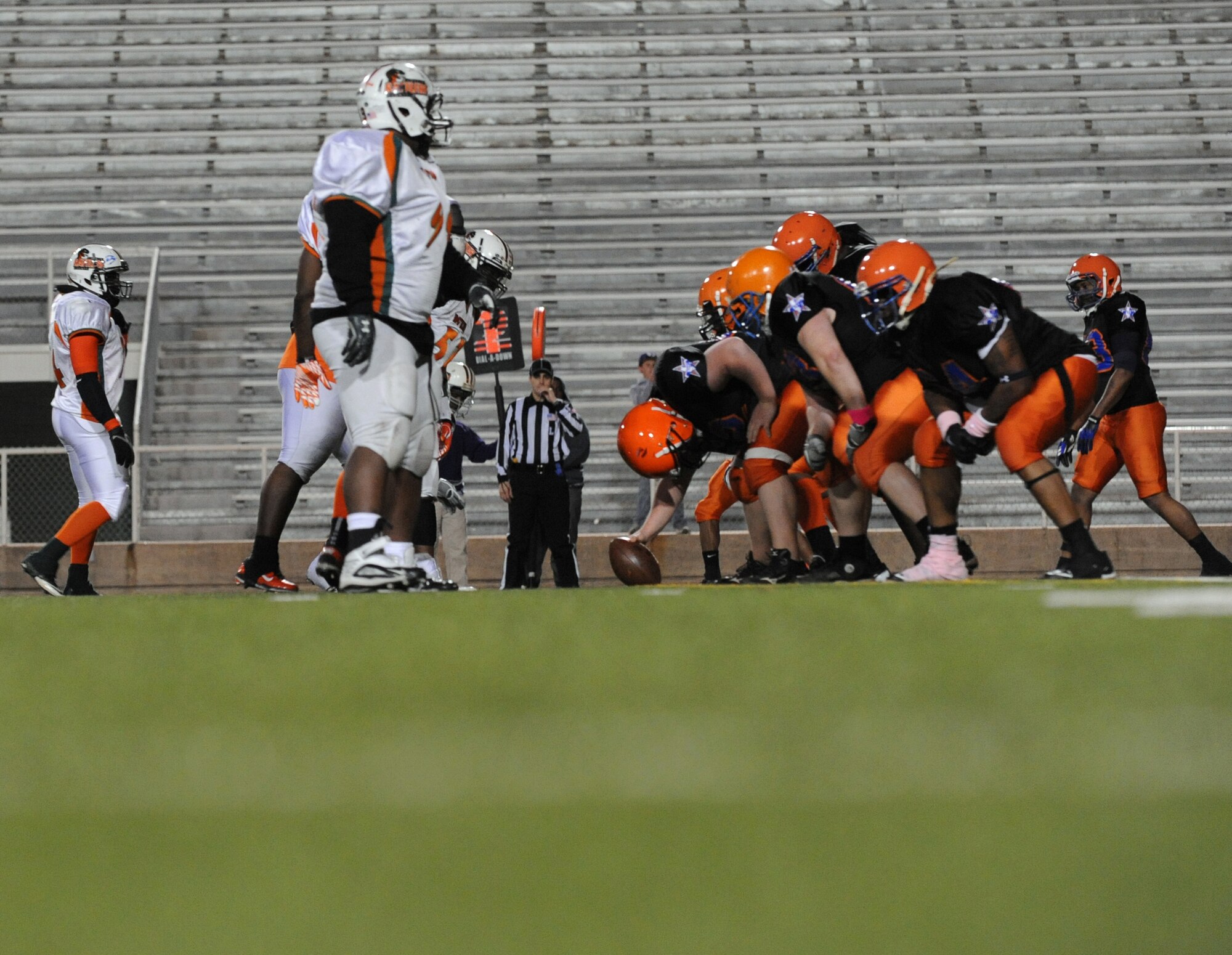 Shreveport-Bossier Knights prepare to snap the ball against the Collin County Rattlers during a football game at Lee Hedges Stadium in Shreveport, La., Feb. 25. The Rattlers defeated the Knights 55-0, however the Knights will have a second shot at the Rattlers May 5 at the Tom Kimbrough Stadium in Murphy, Texas. (U.S. Air Force photo/Airman 1st Class Micaiah Anthony)(RELEASED)
