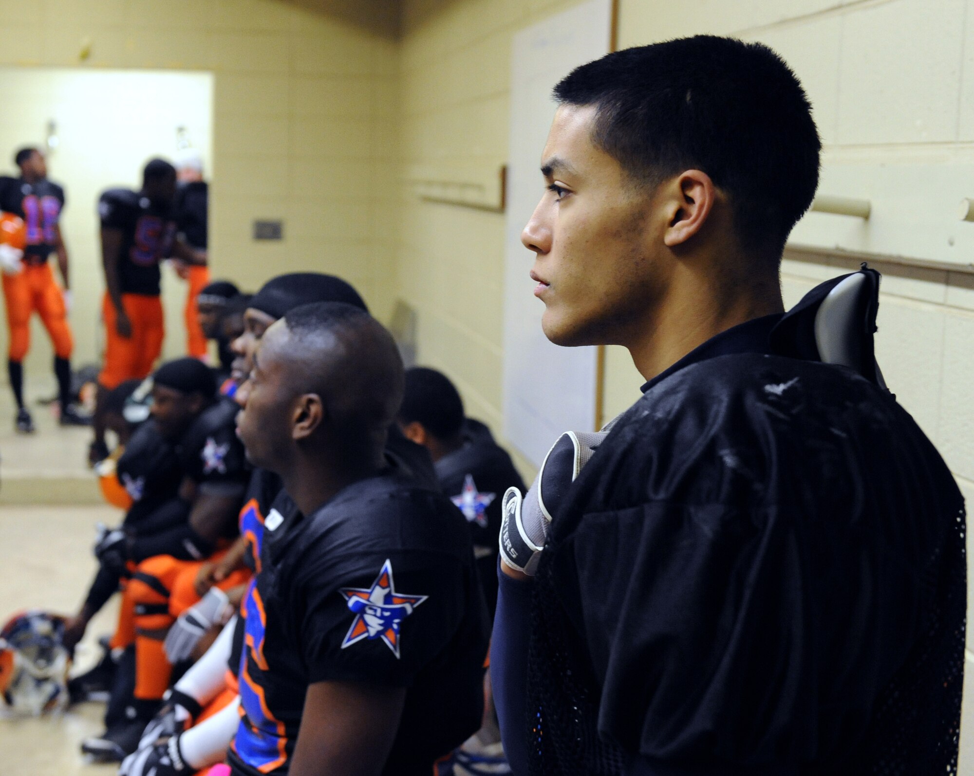Airman 1st Class Joseph Palacio, 2nd Munitions Squadron, waits for the game to start in the locker room at Lee Hedges Stadium in Shreveport, La., Feb. 25. Palacio plays linebacker and defensive end for the Shreveport-Bossier Knights. (U.S. Air Force photo/Airman 1st Class Micaiah Anthony)(RELEASED)
