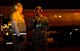 U.S. Air Force Senior Airman Leonard Dunston, left, a crew chief with the 461st Air Control Wing, and Air National Guard Tech. Sgt. Bobby Sharp, fuels operator with the 116th ACW, enjoy a light moment together as they prepare to refuel an E-8 Joint STARS at Robins Air Force Base, Ga., Feb. 15, 2012.  Team JSTARS is an active associate wing where the Air National Guard 116th ACW and the active duty 461st ACW work side-by-side to maintain and fly the E-8 Joint STARS.  (National Guard photo by Master Sgt. Roger Parsons/Released)