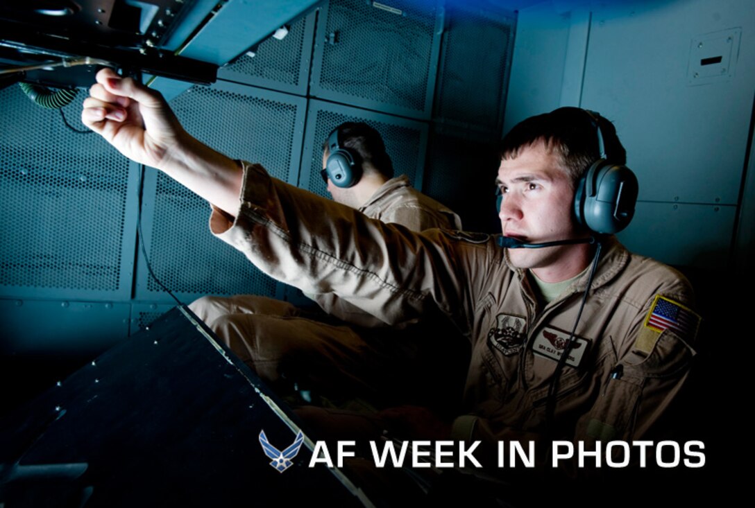 Senior Airman Clay Wonders, a KC-10 Extender boom operator with the 908th Expeditionary Air Refueling Squadron, adjusts his mirror before refueling an F/A-18C Hornet over Afghanistan on Feb. 26, 2012. The 908th EARS provides critical aerial refueling to aircraft in the area of responsibility, delivering more than one million gallons of fuel to the fight every day. (U.S. Air Force photo/Staff Sgt. Greg C. Biondo)