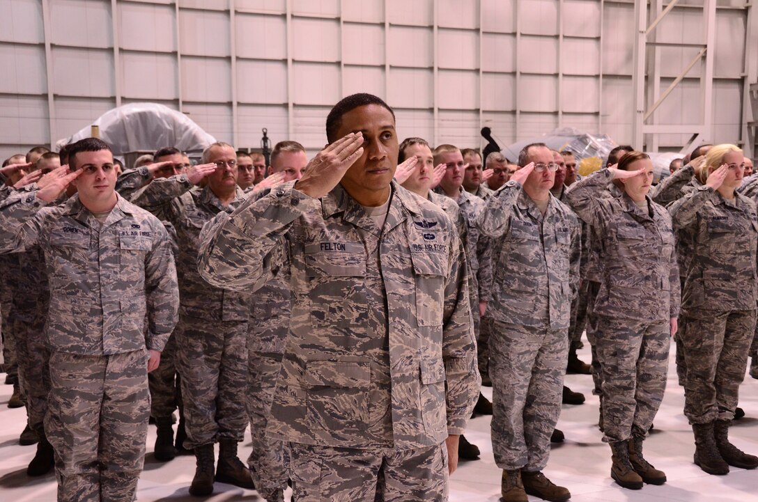 WRIGHT-PATTERSON AIR FORCE BASE, Ohio – Members of the 445th Maintenance Group render a first salute to their incoming commander, Col. Brett Newman, at the MXG appointment of command ceremony Feb. 4. Newman comes to the 445th from the 934th Maintenance Group at Minneapolis-St. Paul Air Reserve Station, Minn., where he served as the maintenance group commander. (U.S. Air Force photo/Senior Airman Mikhail Berlin) 