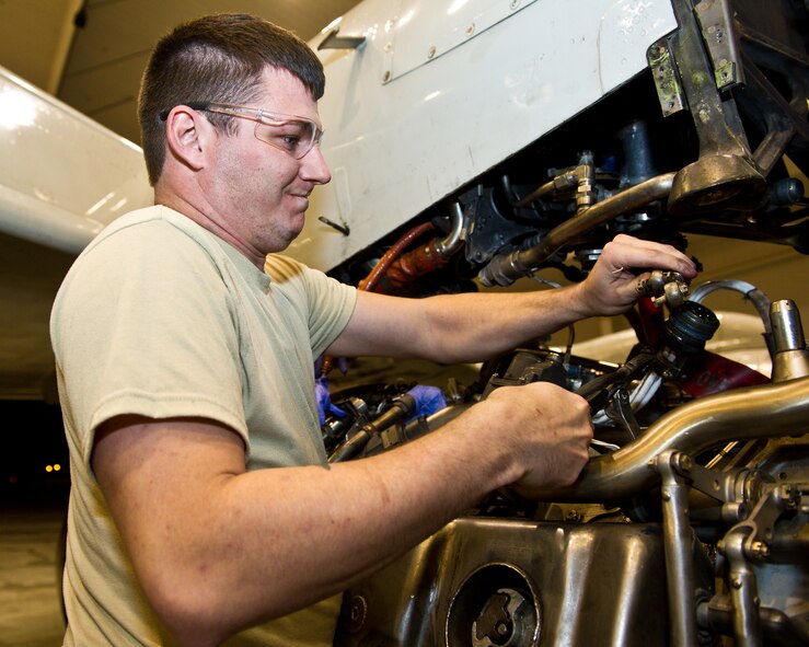 Air National Guard Airman 1st Class Marion Johnson, 116th Air Control Wing, performs maintenance on a E-8 Joint STARS Pratt and Whitney TF33-102C engine at Robins Air Force Base, Ga., Feb. 15, 2012. Johnson and other members working nightshift with the 116th Maintenance Squadron engine shop performed  maintenance during an engine change operation.
(National Guard photo by Master Sgt. Roger Parsons/Released)
