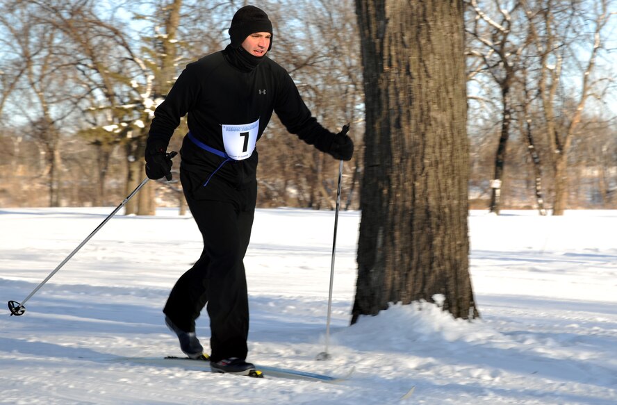 Airman 1st Class Jeffrey Airman, a pay technician with the 319th Comptroller Squadron on Grand Forks Air Force Base, N.D., finds his stride during the cross-country ski portion of the 3rd Annual Cold Avenger’s End It Extreme North Dakota Iceman Triathlon on Feb. 25, 2012, in downtown Grand Forks, N.D. Lowder finished the challenging, three-mile long ski course in a time of 42 minutes and 51 second. (U.S. Air Force photo Airman 1st Class Xavier Navarro)