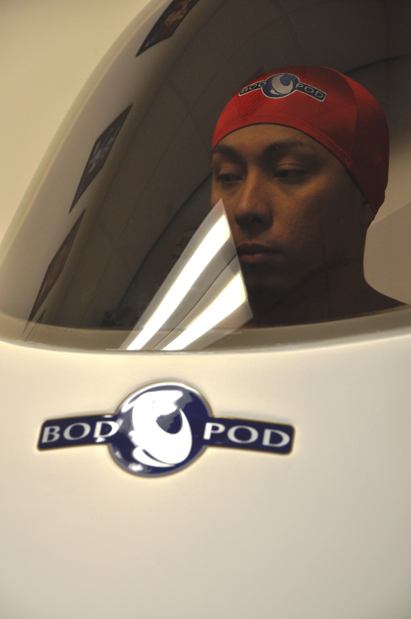 Senior Airman Danyel Alvarez, 325th Maintenance Operations Squadron, utilized the Health and Wellness Center’s BOD POD to determine his percentage of body fat. (U.S. Air Force photo by Senior Airman Rachelle Elsea)