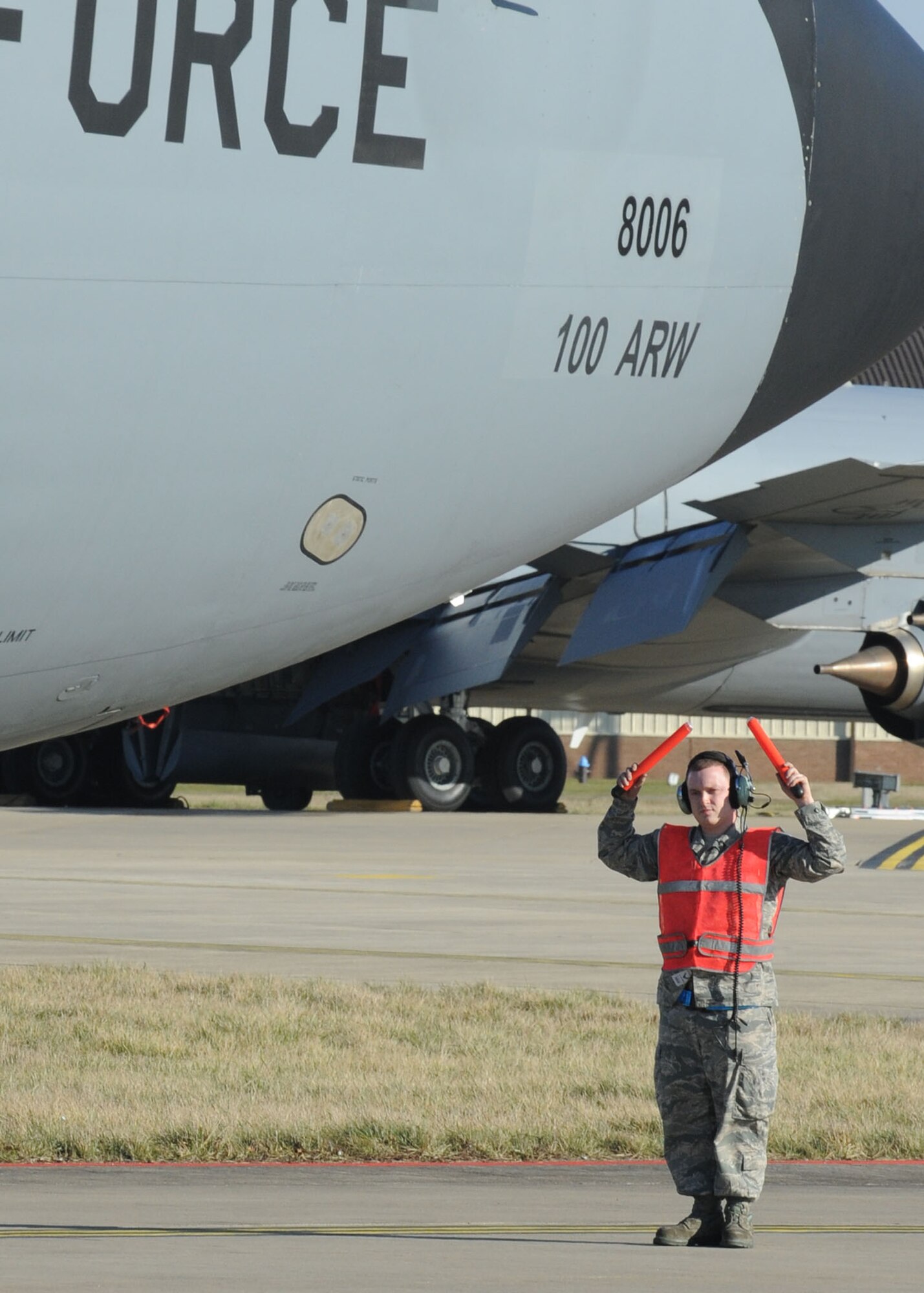 RAF MILDENHALL, England – Staff Sgt. Scott Kenady, 100th Aircraft Maintenance Squadron crew chief, marshals a KC-135 Stratotanker aircraft here Feb. 23, 2012. Kenady, who has been assigned to RAF Mildenhall for one-and-a-half years, works with all aircraft assigned to the 100th Air Refueling Wing but is the dedicated crew chief for the wing’s flagship aircraft. (U.S. Air Force photo/Tech. Sgt. Neal X. Joiner) 
