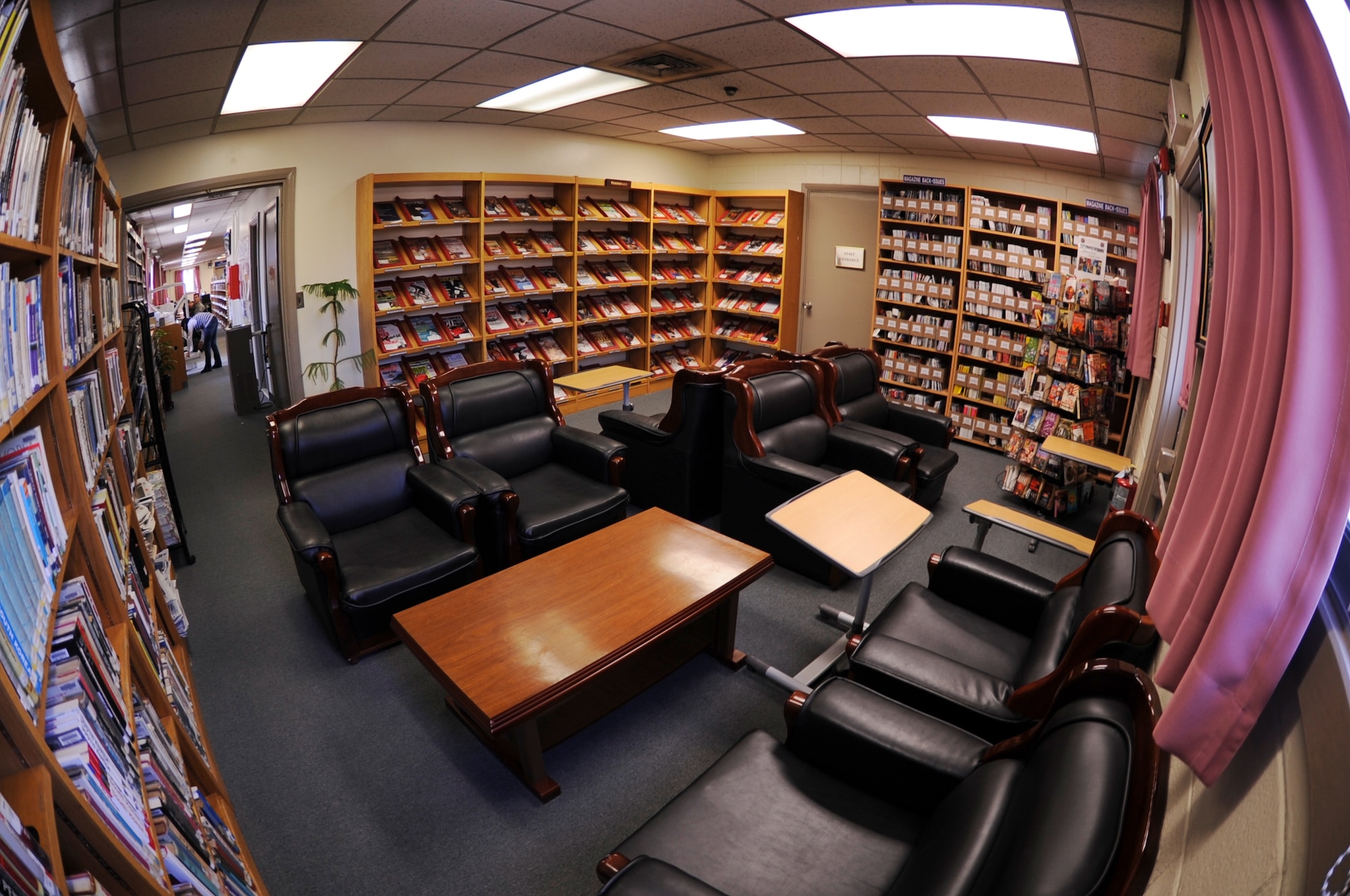 One of the many sitting areas available to Airmen at the Rosenblum Memorial Library on Kunsan Air Base, Republic of Korea, Feb. 29, 2012.  With more than 75 periodical subscriptions, the library offers a wide selection of popular magazines. (U.S. Air Force photo by Senior Airman Jessica Hines/Released) 