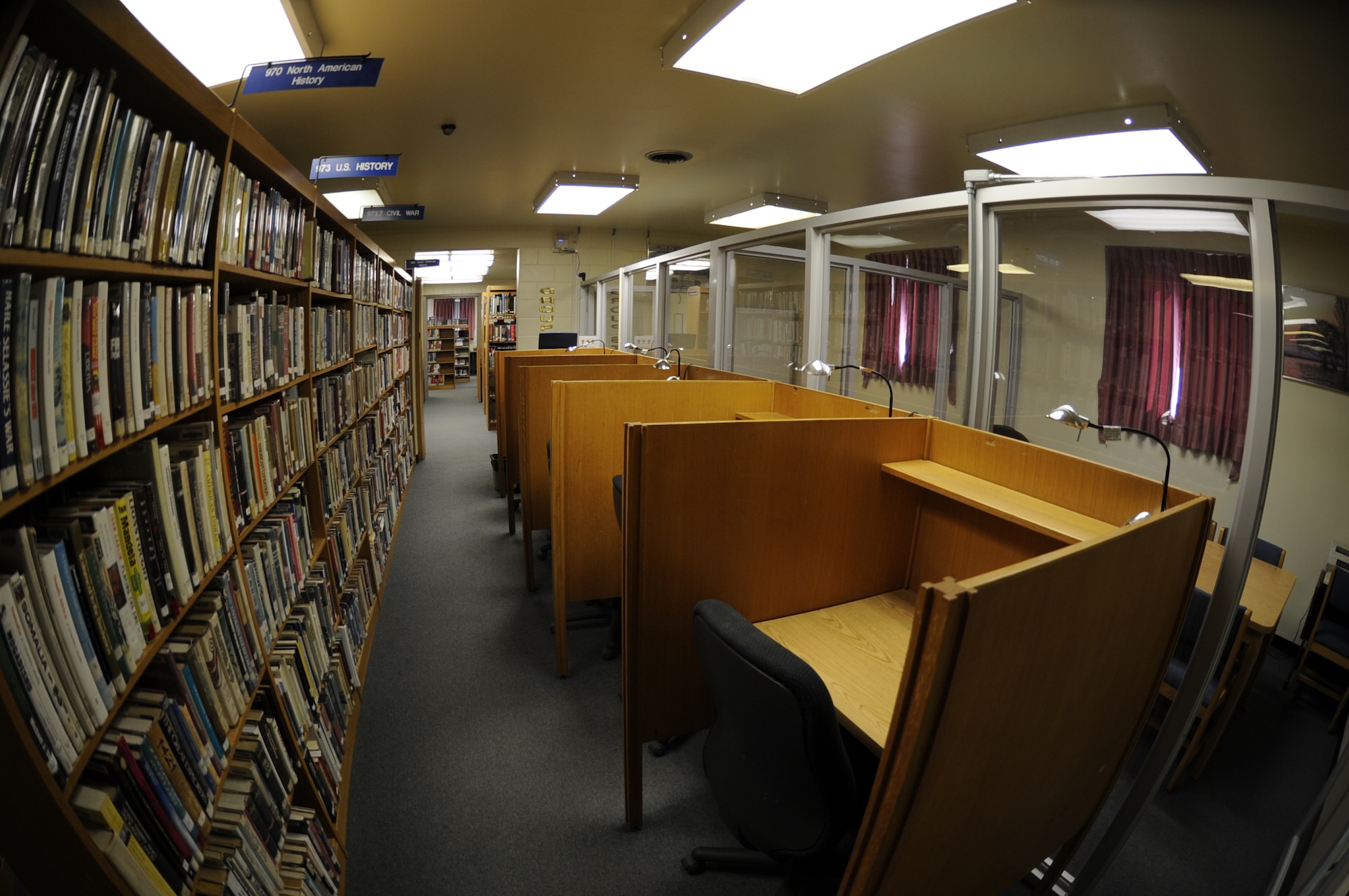 Private as well as group study areas sit available for service members to use at the Rosenblum Memorial Library on Kunsan Air Base, Republic of Korea, Feb. 29, 2012. The library offers Airmen who need a quiet place to read many study area options. (U.S. Air Force photo by Senior Airman Jessica Hines/Released) 