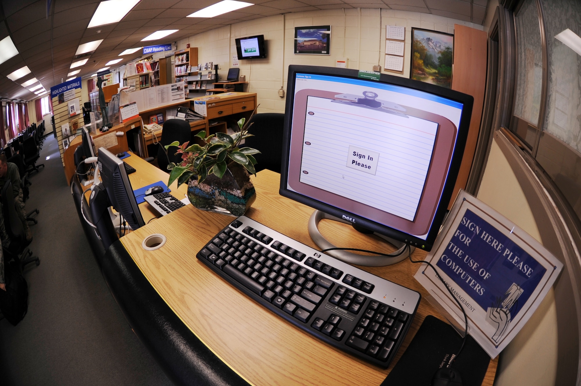The computer sign-in desk sits available for Airmen to access one of the 27 commercial access computers available at the Rosenblum Memorial Library on Kunsan Air Base, Republic of Korea, Feb. 29, 2012.  The computers are free to use for all service members and civilians on Kunsan Air Base. (U.S. Air Force photo by Senior Airman Jessica Hines/Released)