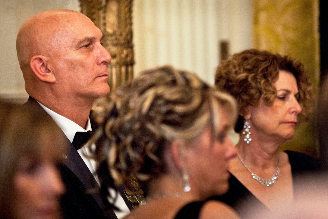Army Chief of Staff Gen. Raymond T. Odierno, left, and his wife, Linda, right, attend "A Nation's Gratitude Dinner," an event hosted by President Barack Obama and First Lady Michelle Obama to honor Iraq War veterans at the White House in Washington, D.C., Feb. 29, 2012.
