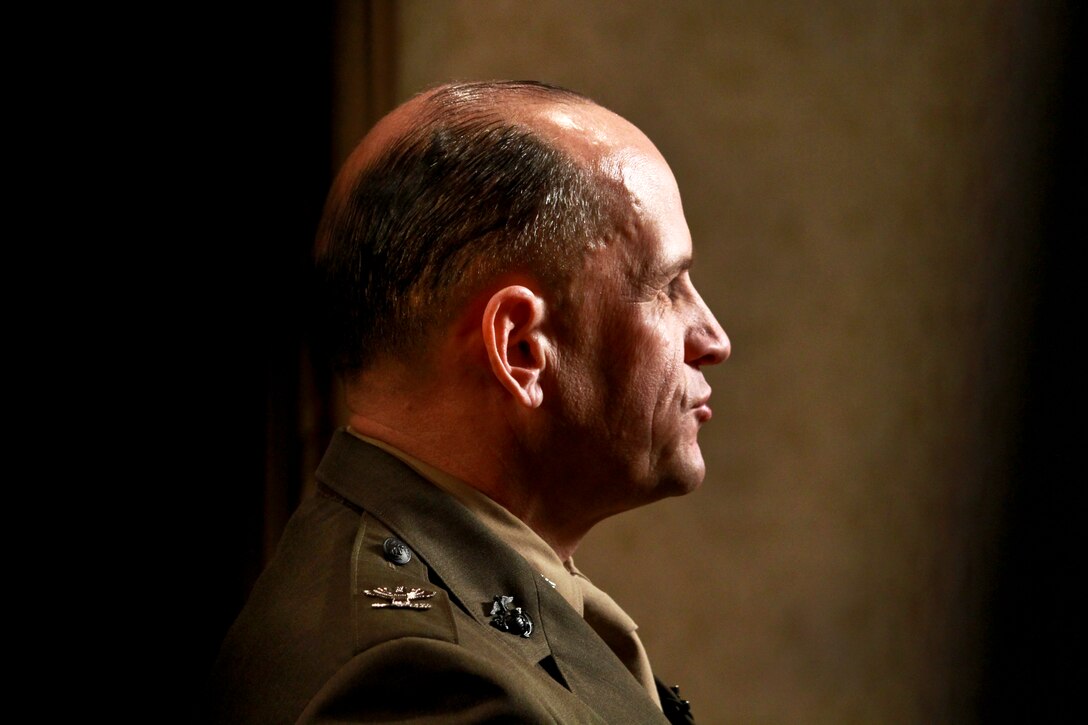 Marine Corps Col. Todd Scott Desgrosseilliers, who served in Iraq twice as a battalion executive officer and later as a battalion commander, talks to a reporter before a reception to honor Iraq War veterans in Crystal City, Va., Feb. 29, 2012.