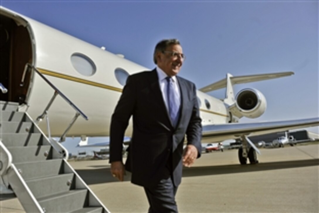 Defense Secretary Leon E. Panetta steps off his plane as he arrives in Louisville, Ky., March 1, 2012. Panetta will deliver remarks on leadership and public service to the University of Louisville's Brown and Williamson Club.