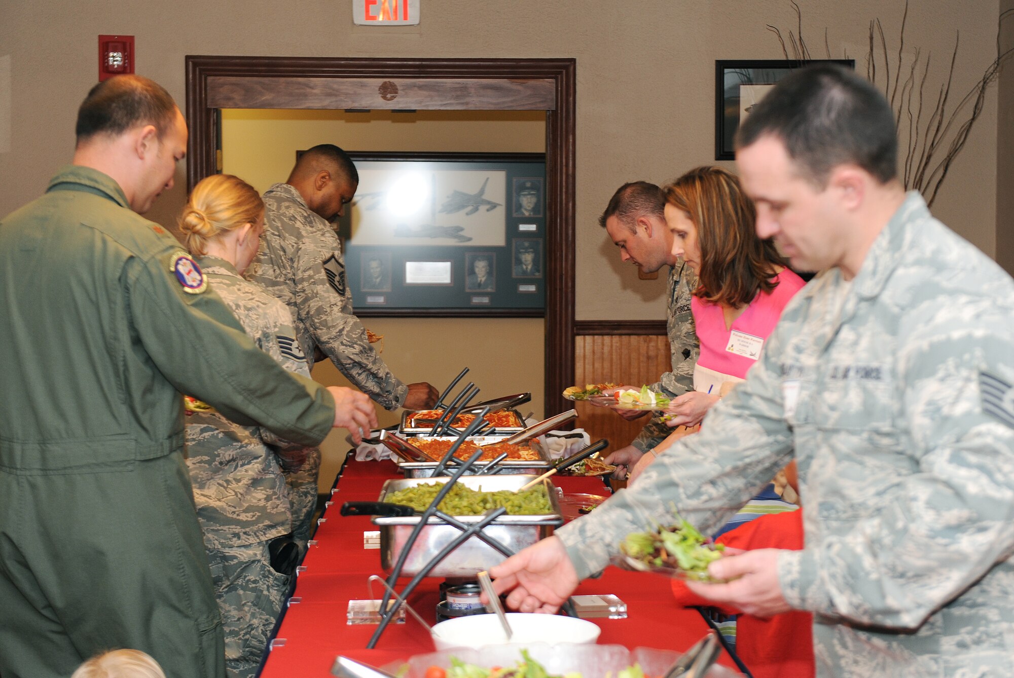 Team Little Rock Members  go through the food line during the Welcome Home Warriors event, March 2, 2012, at Little Rock Air Force Base, Ark. The Welcome Home warrior’s event is designed to recognize deployers who returned home through in small groups, and not part of a large rotator. (U.S. Air Force photo by Airman 1st Class Ellora Remington)