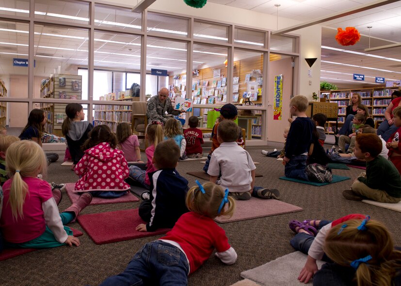 HOLLOMAN AIR FORCE BASE, N.M. – Master Sgt. Michael Cuevas, 49th Materiel Maintenance Support Squadron first sergeant, reads “Green Eggs and Ham” March 2, at the base library for the birthday celebration of Theodor Geisel, who is more commonly known as “Dr. Seuss.” “Green Eggs and Ham,” one of Dr. Seuss’ 46 published children’s books, is Seuss’ best-selling book, with more than eight million copies sold worldwide. Cuevas was one of three first sergeants who read different Dr. Seuss books to more than 40 children of Team Holloman. (U.S. Air Force photo by Airman 1st Class Siuta B. Ika/Released)