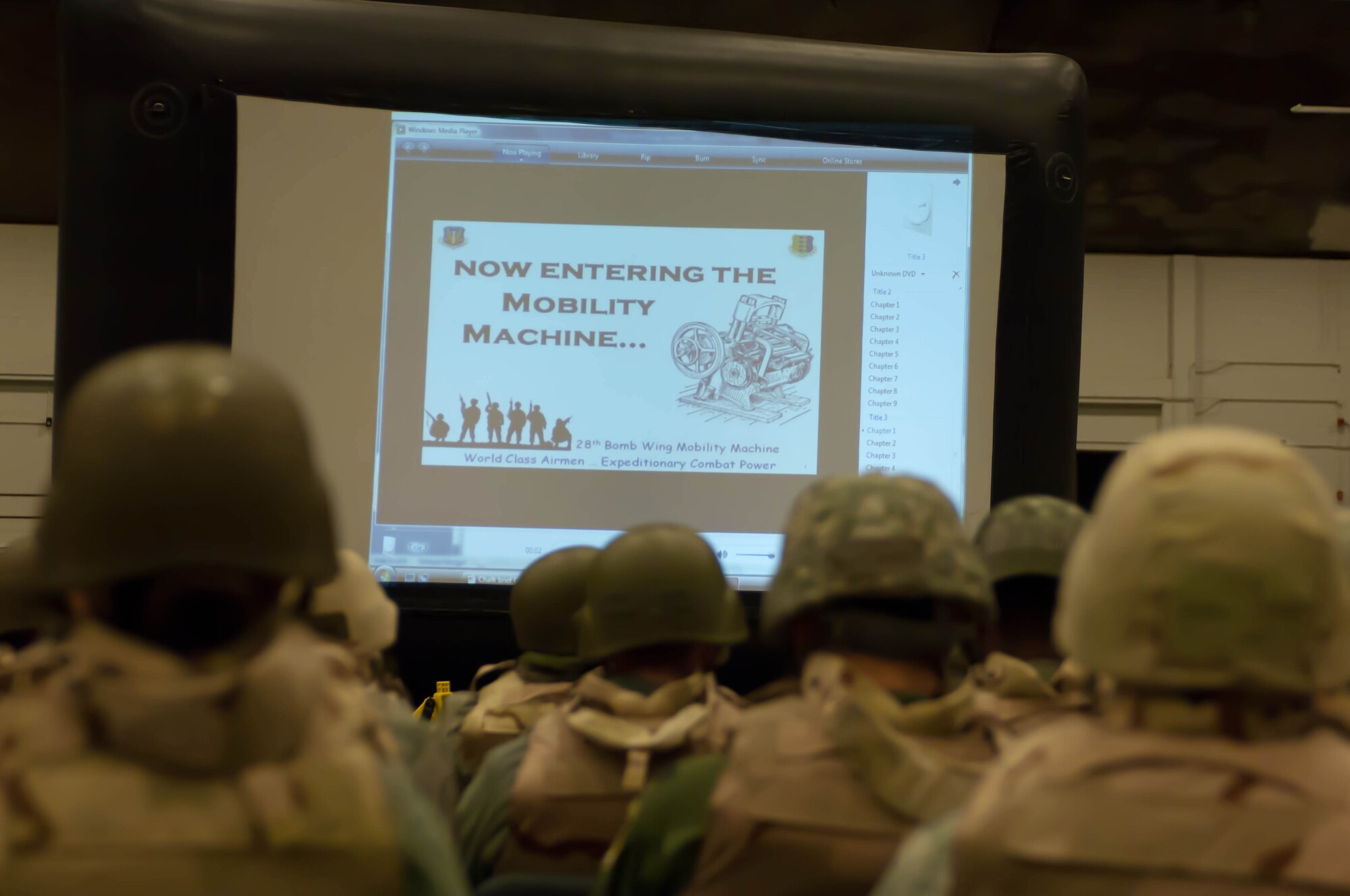 Airmen receive a pre-deployment briefing at the Pride Hangar during an Operational Readiness Exercise at Ellsworth Air Force Base, S.D., Feb. 22, 2012. These briefings provided Airmen with vital information needed to meet exercise objectives. (U.S. Air Force photo by Airman 1st Class Zachary Hada/Released)