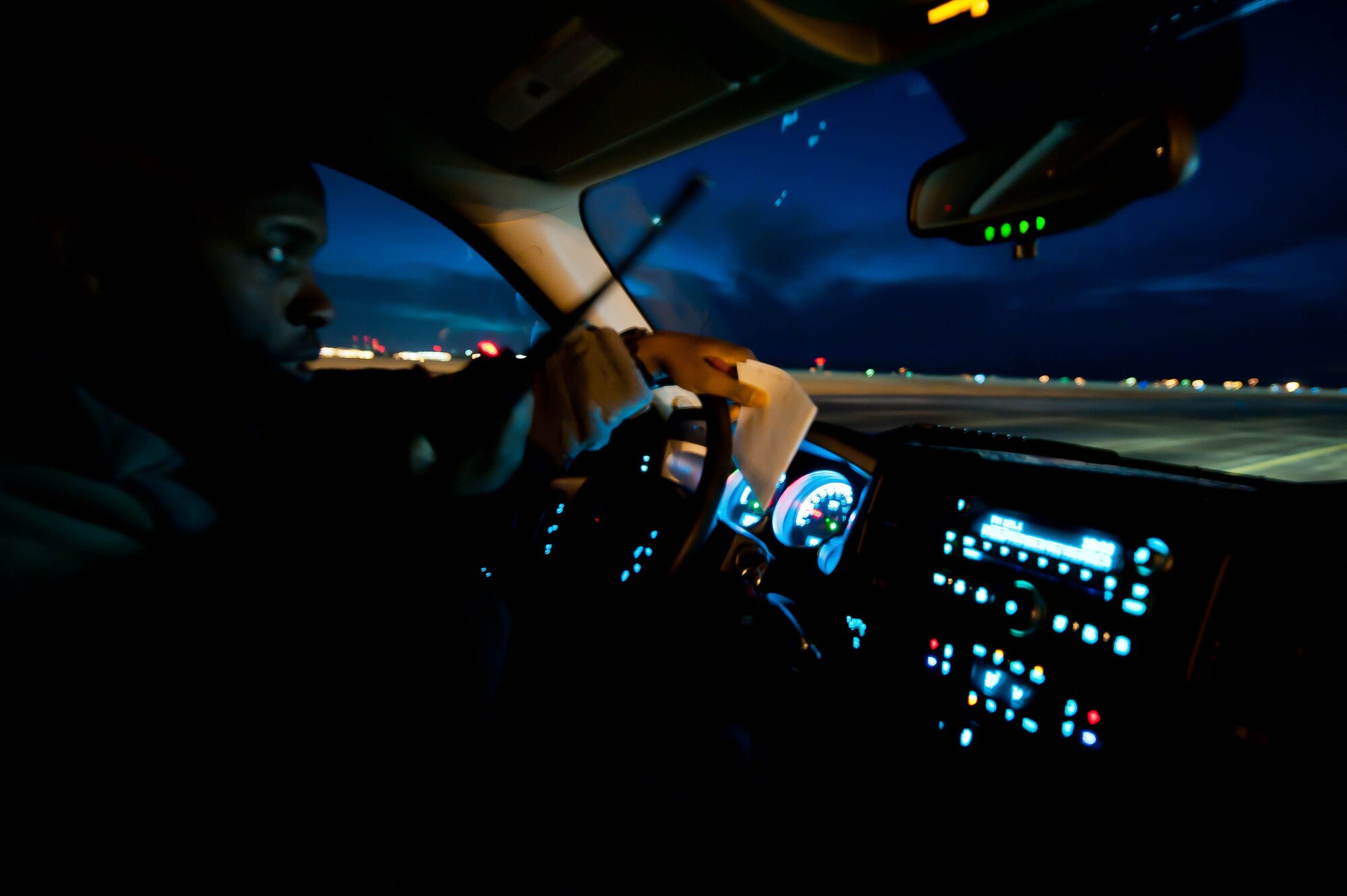 Senior Master Sgt. Warren Relaford, 28th Operations Support Squadron airfield management manager, performs runway safety checks to gather condition readings on the flightline during an Operational Readiness Exercise on Ellsworth Air Force Base, S.D., Feb. 23, 2012. The runway condition is verified regularly to ensure the safety of aircraft and other vehicles on the runway. (U.S. Air Force photo by Airman 1st Class Zachary Hada/Released)