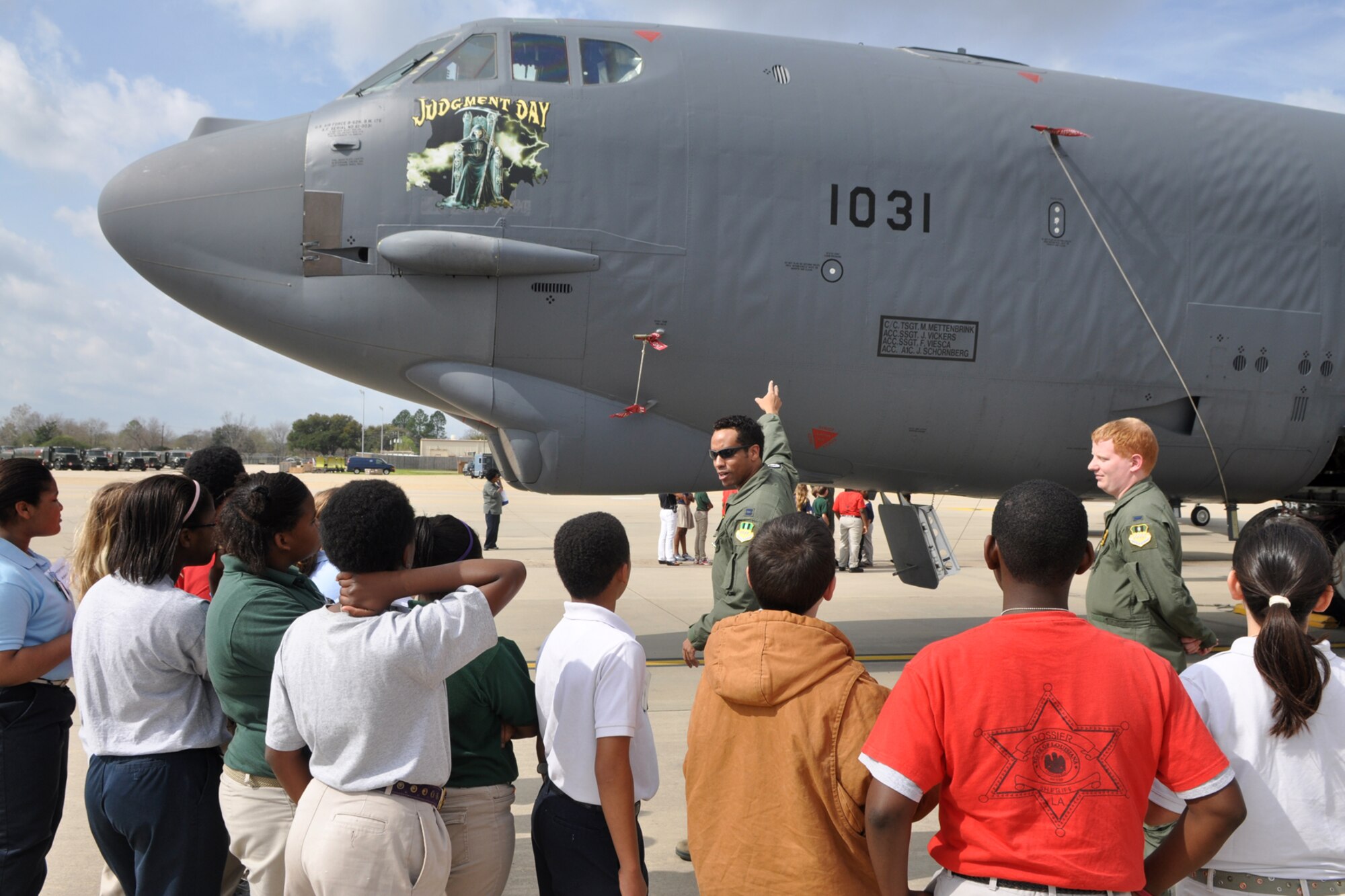 U.S. Air Force Capt. Mike Matthews, an instructor pilot at the 93rd Bomb Squadron’s Formal Training Unit, explains the war-time capabilities of a B-52 Startofortress to a group of local 5th grade students during a static tour at Barksdale Air Force Base, La., March 2, 2012. Matthews was assisted by 1st Lt. Brian Knutson, who is a student at the FTU. Both officers are assigned to the 11th Bomb Squadron, 2nd Bomb Wing at Barksdale. The students are attending STARBASE Louisiana, at Barksdale, one of 70 national STARBASE sites. It is sponsored by the 307th Bomb Wing of the Air Force Reserve Command. The program presents an exciting 25-hour hands-on minds-on Science, Technology, Engineering, and Mathematics (STEM) curriculum to area 5th grade students and their teachers. STARBASE Louisiana creates an environment to actively engage students in STEM exploration to excite their interest, develop a solid concept base, and encourage them to pursue these areas in future studies. Approximately 35 students from Carrie Martin Elementary in Bossier Parish took part in the static tour. (U.S. Air Force photo by Master Sgt. Jeff Walston)